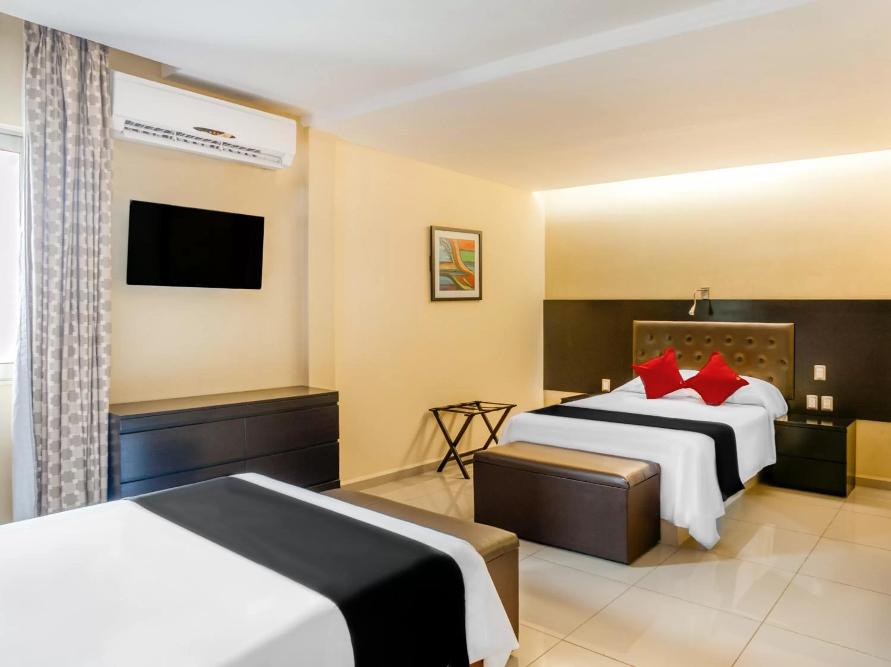 Bed in Veracruz Suites Hotel