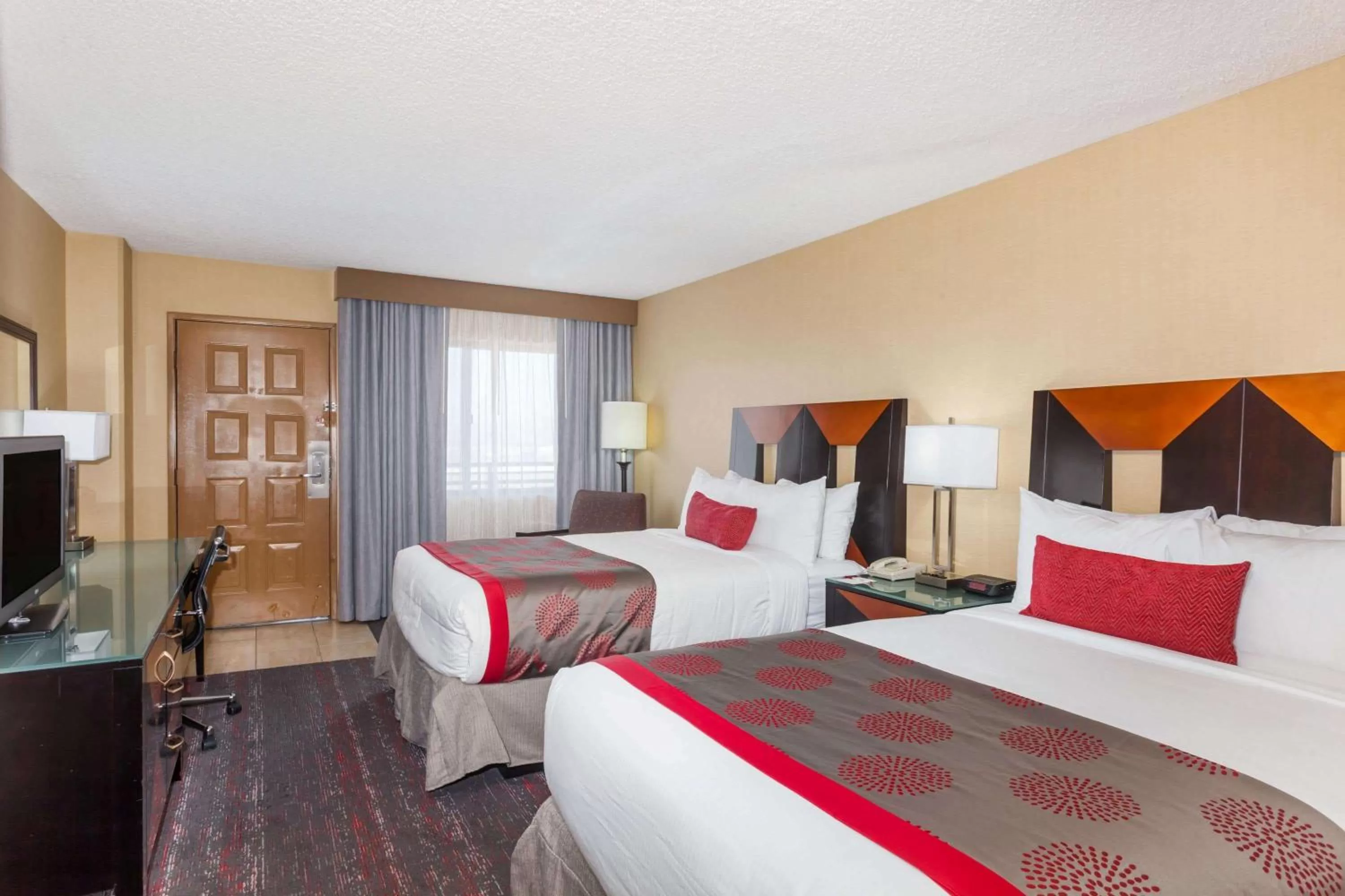 Photo of the whole room, Bed in Ramada by Wyndham San Diego National City