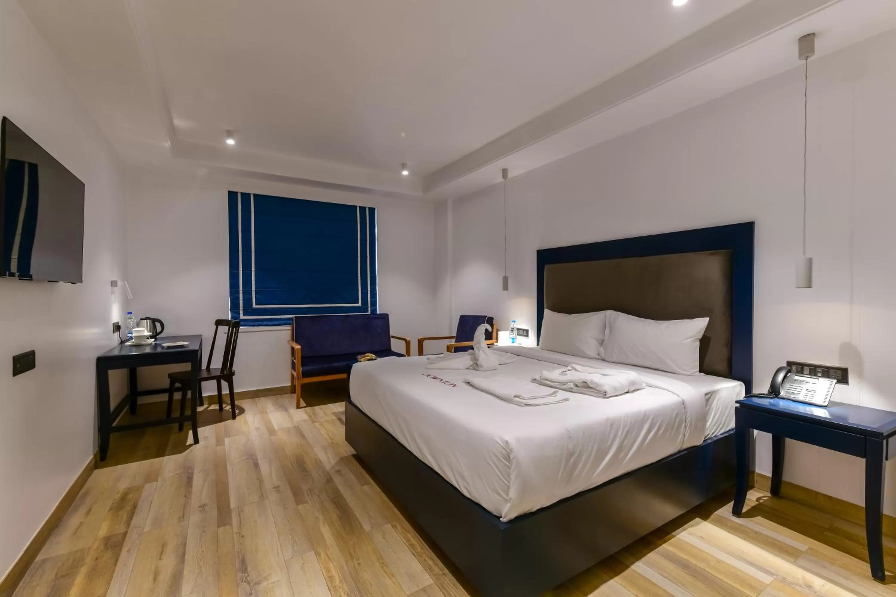 Bedroom in The Downton Hotel