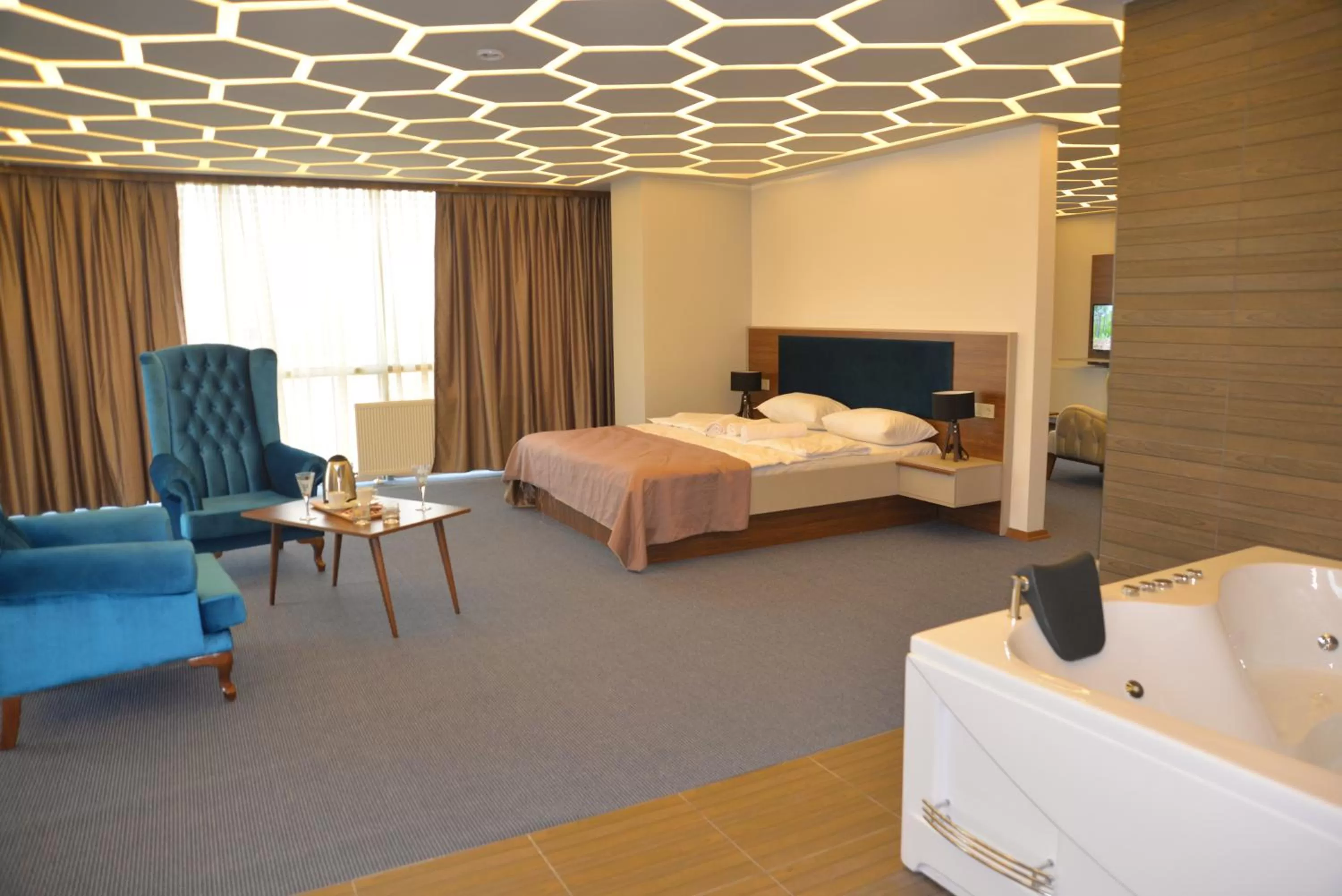 Bed in TEVETOGLU HOTEL