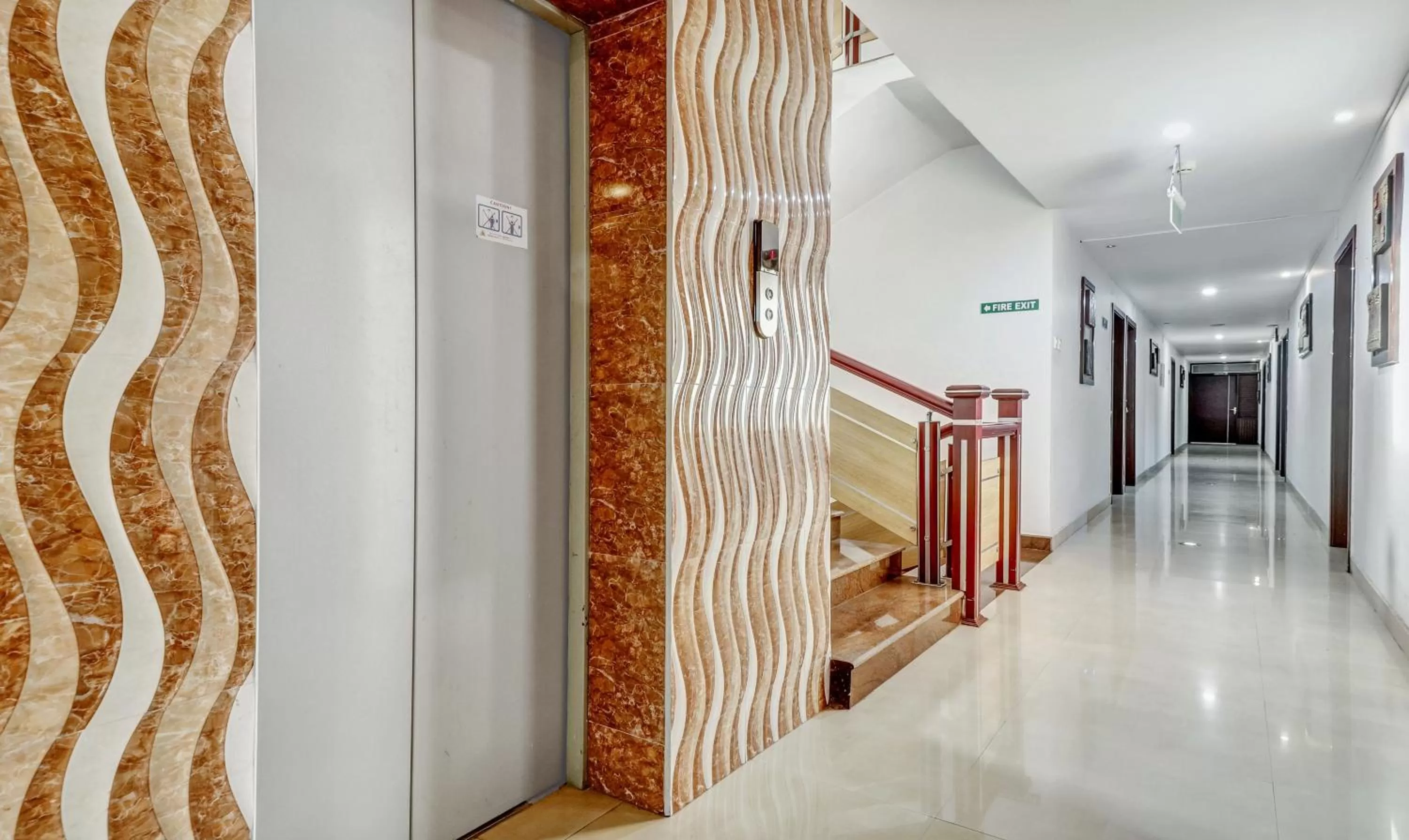 elevator, Bed in Treebo Symphony Hotels And Resorts Angamally