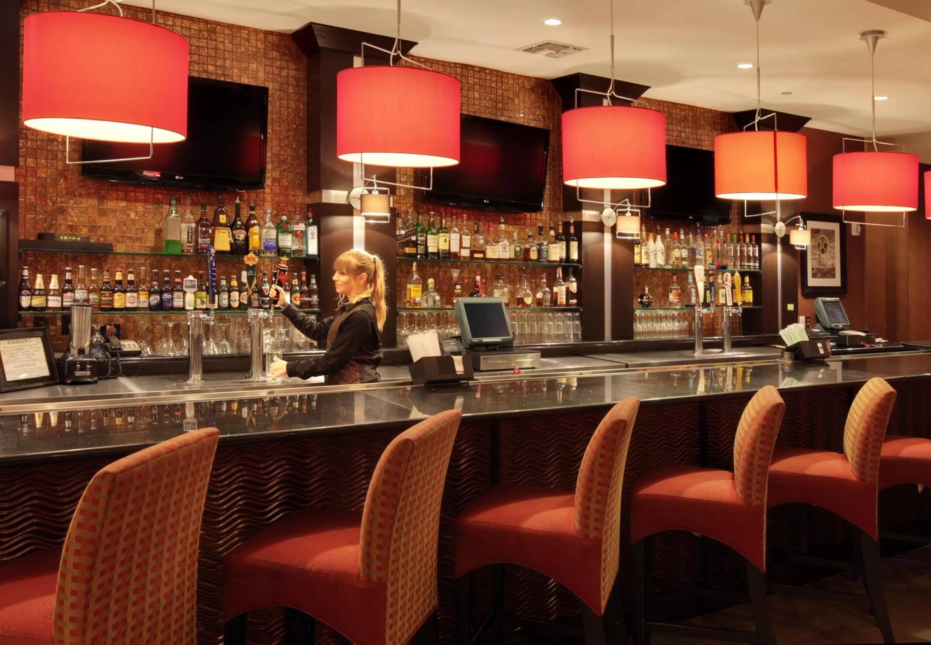 Lounge or bar in Holiday Inn Houston East-Channelview by IHG