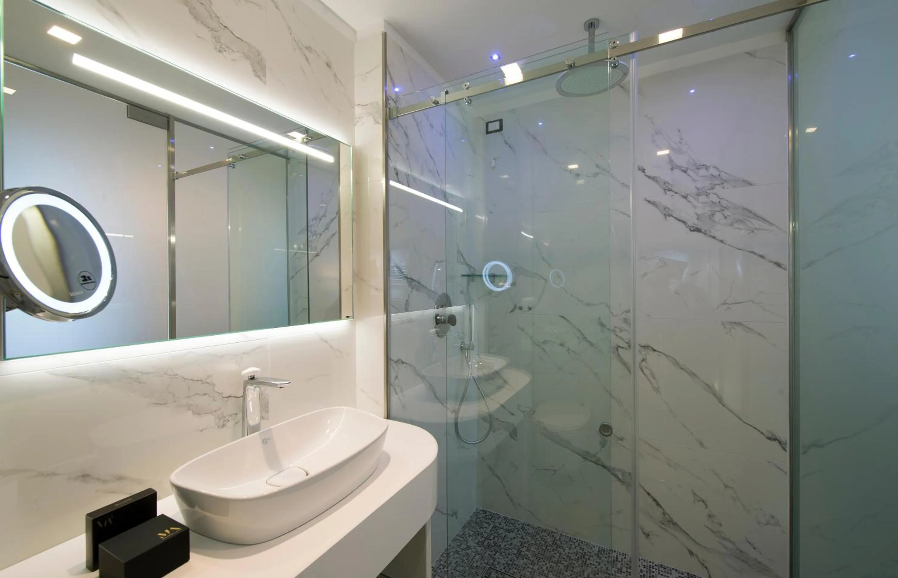 Toilet in Gatto Bianco Mia Aparthotel