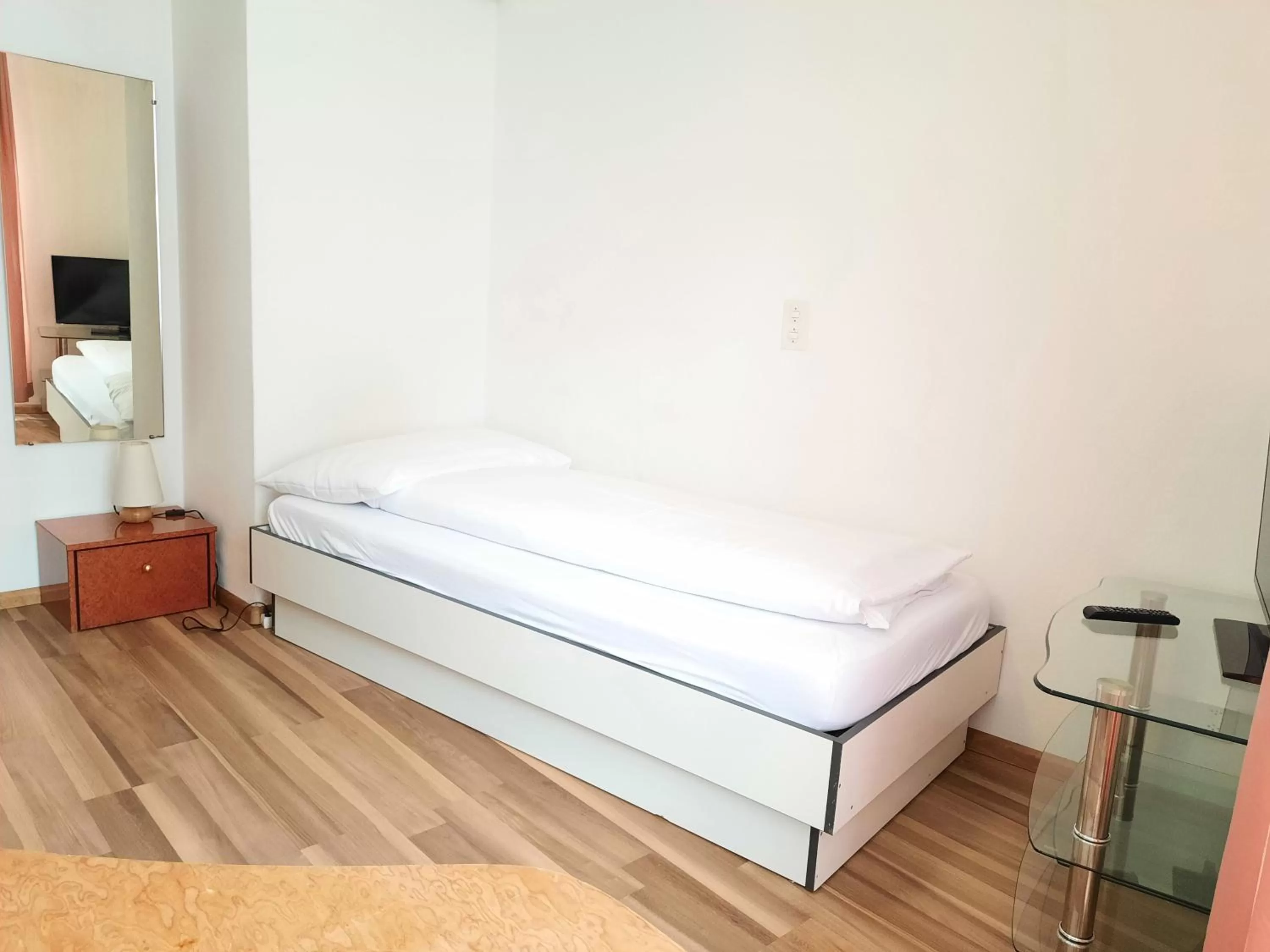 Bed in Spalenbrunnen Hotel & Restaurant Basel City Center