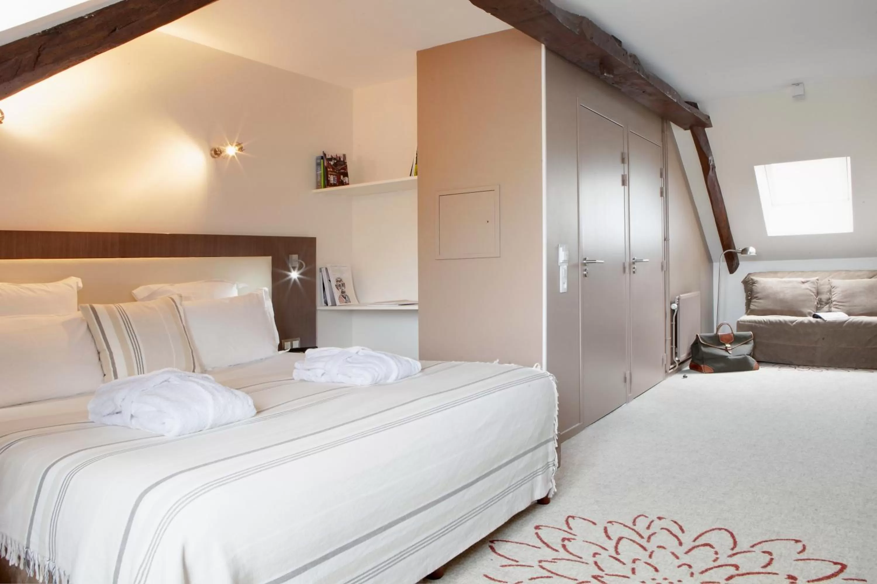 Photo of the whole room, Bed in Hôtel Le Benhuyc