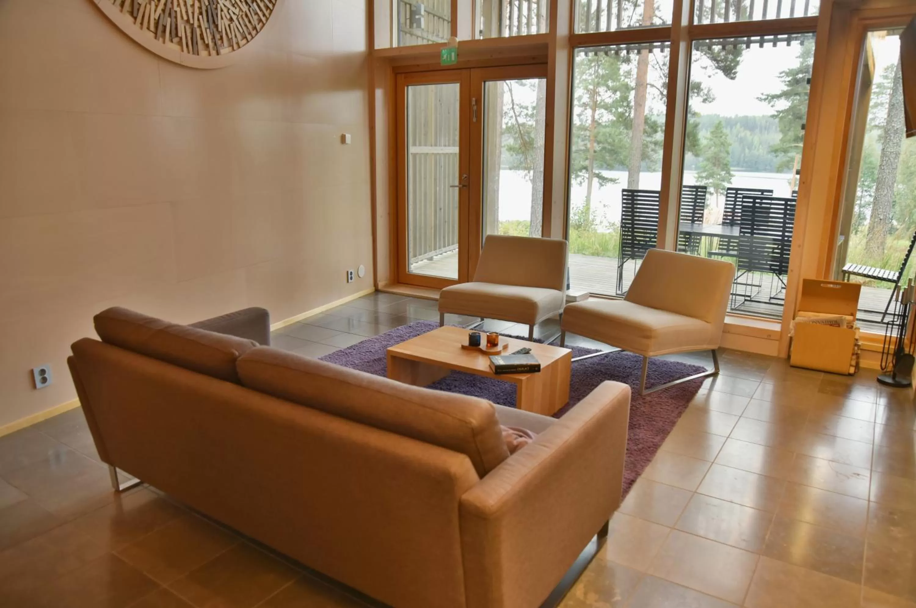 Seating Area in Saimaanranta Resort by Anttolanhovi