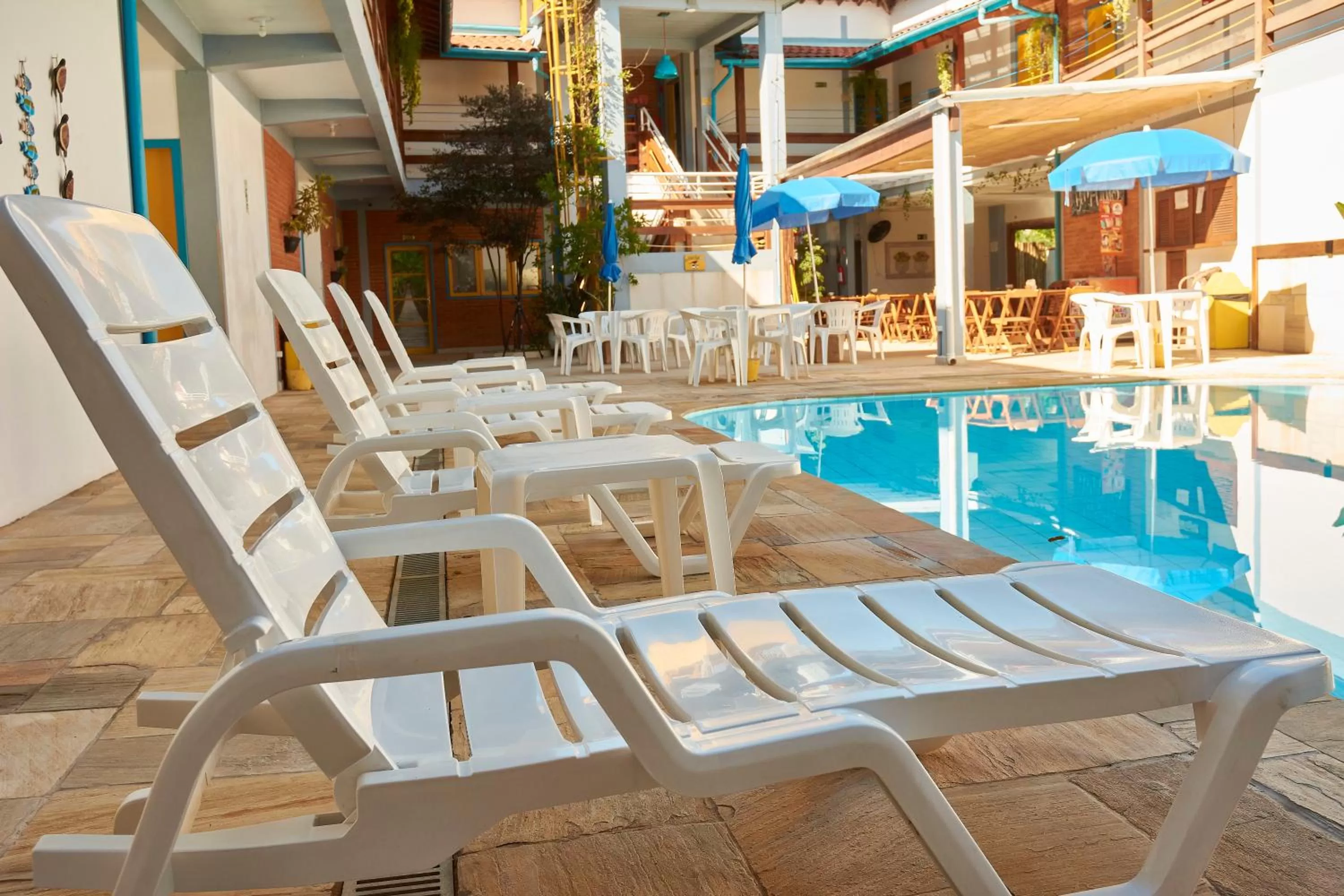 Swimming pool in Hotel e Pousada Pouso54