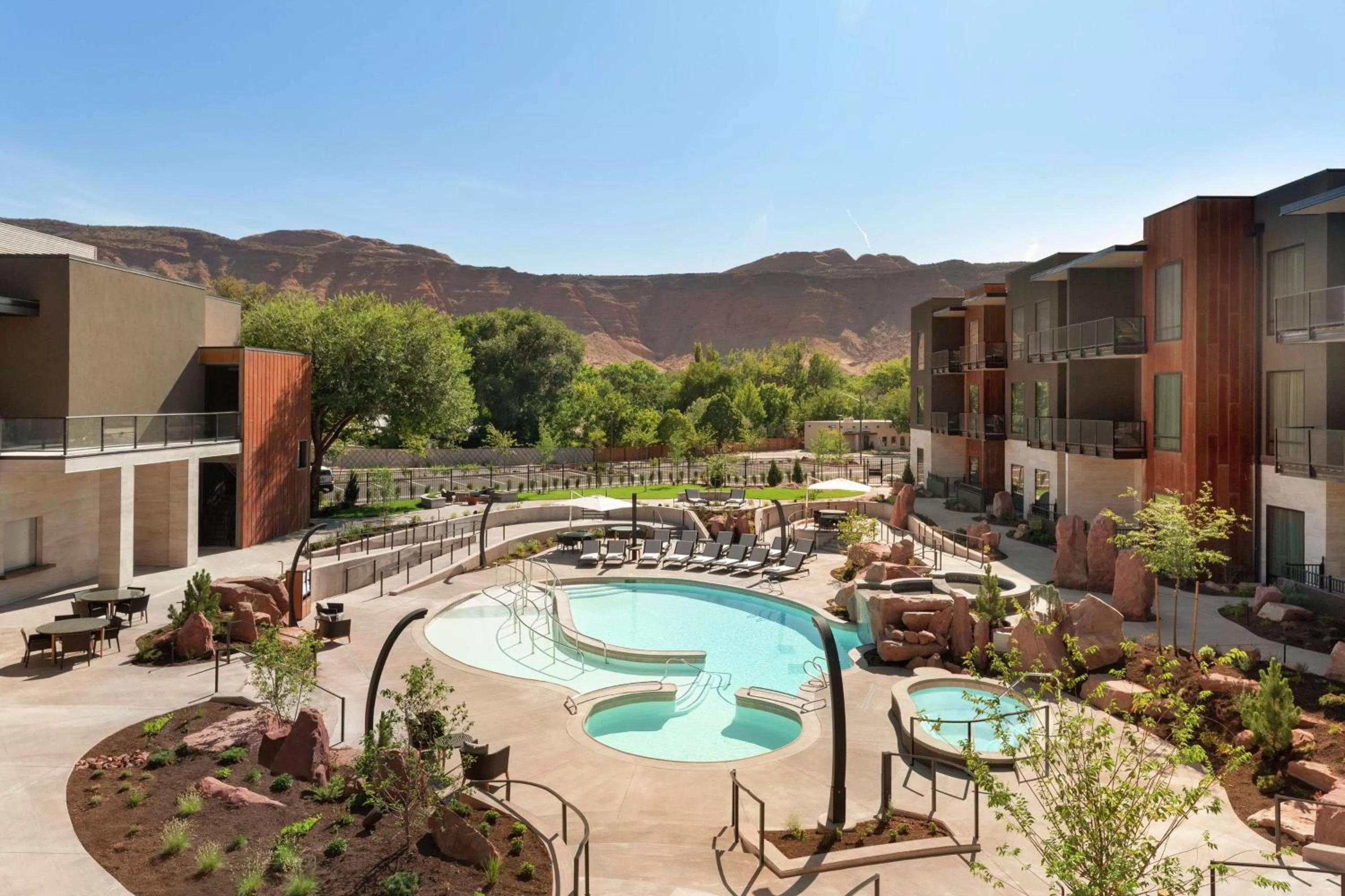 Pool view in Hoodoo Moab, Curio Collection by Hilton