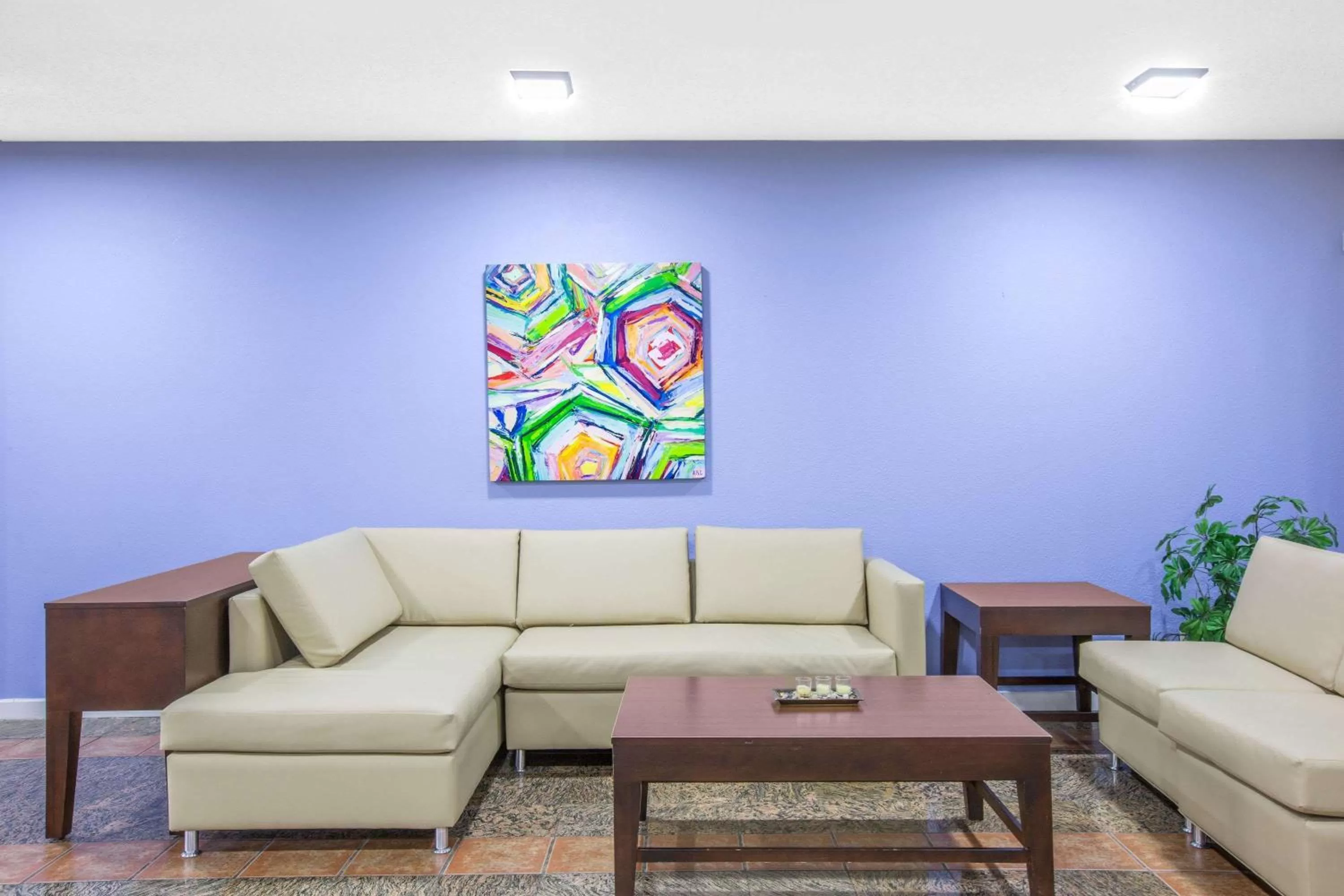 Seating area in Super 8 by Wyndham Brinkley