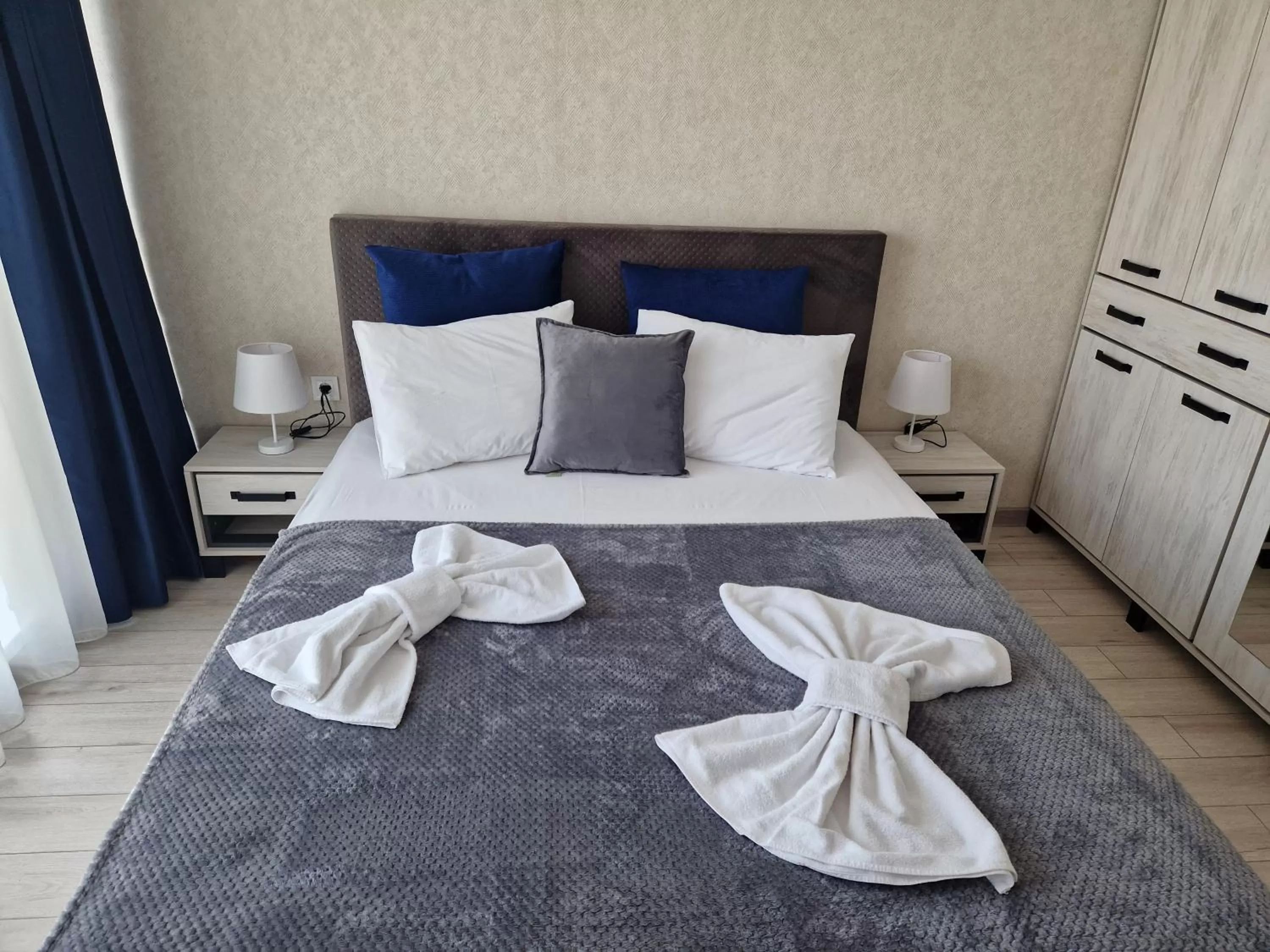 Bed in PAPAYA APARTMENTS