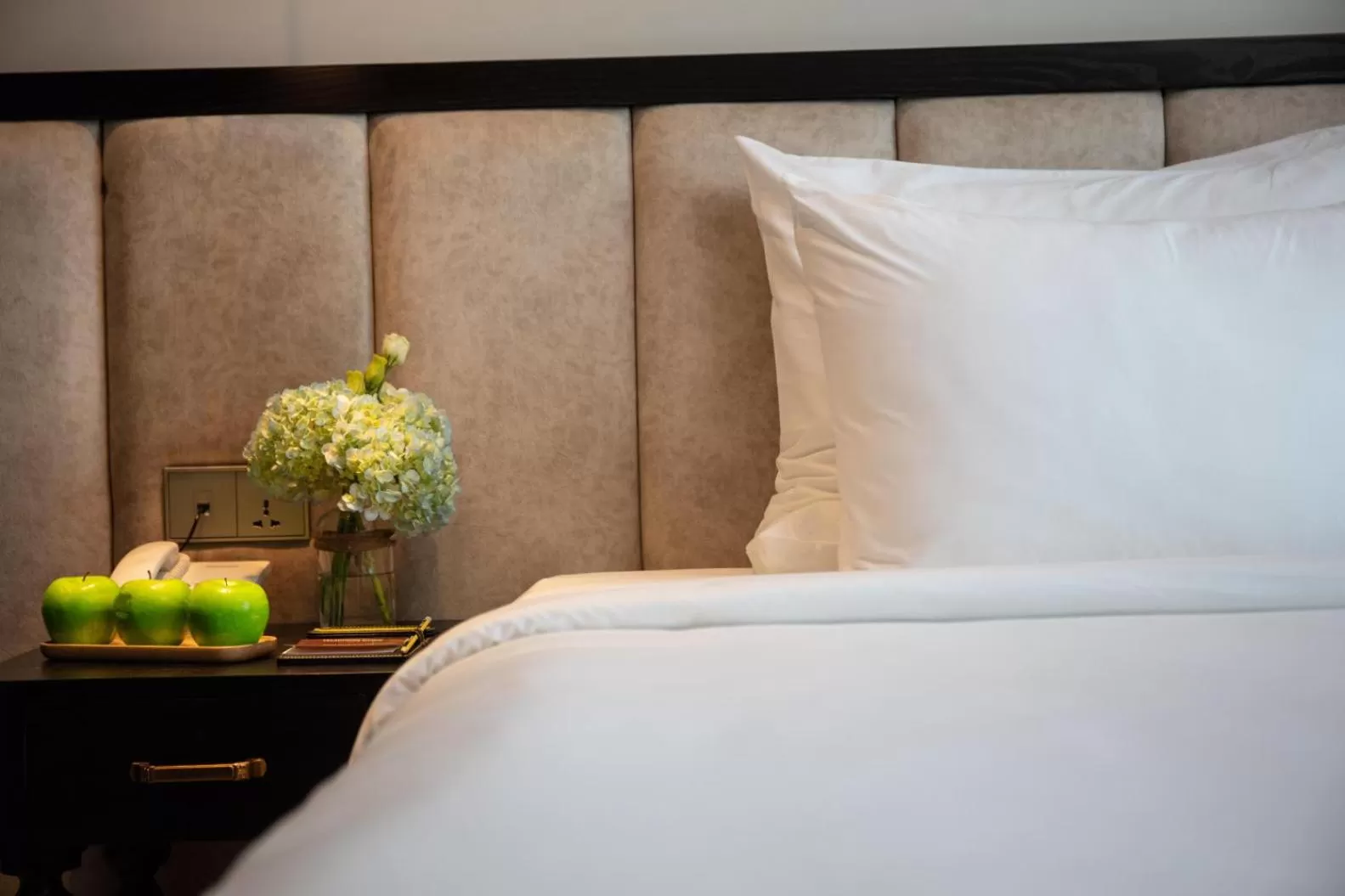 Bed in FTE Ba Dinh Hotel