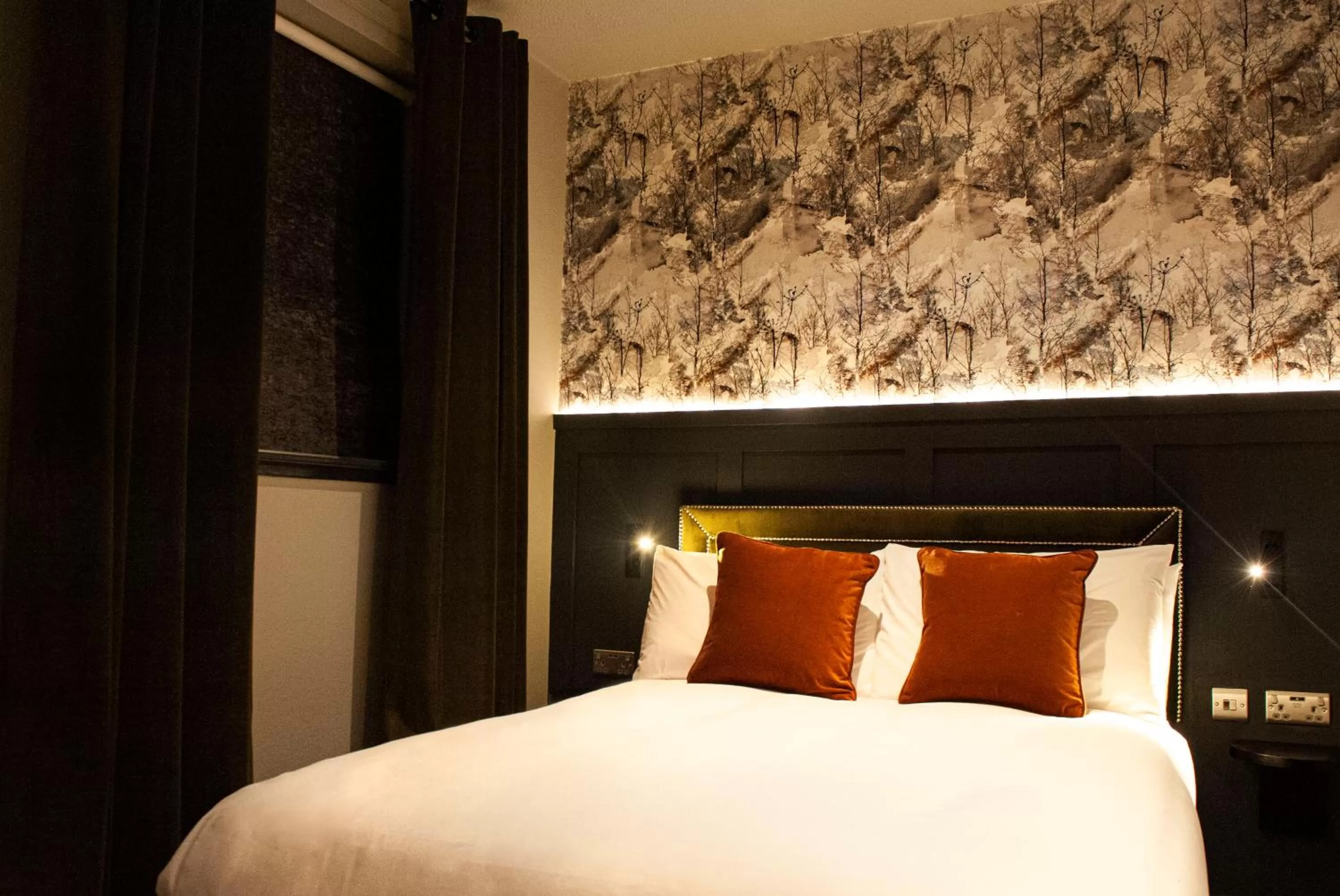 Bed in The Coachman Hotel