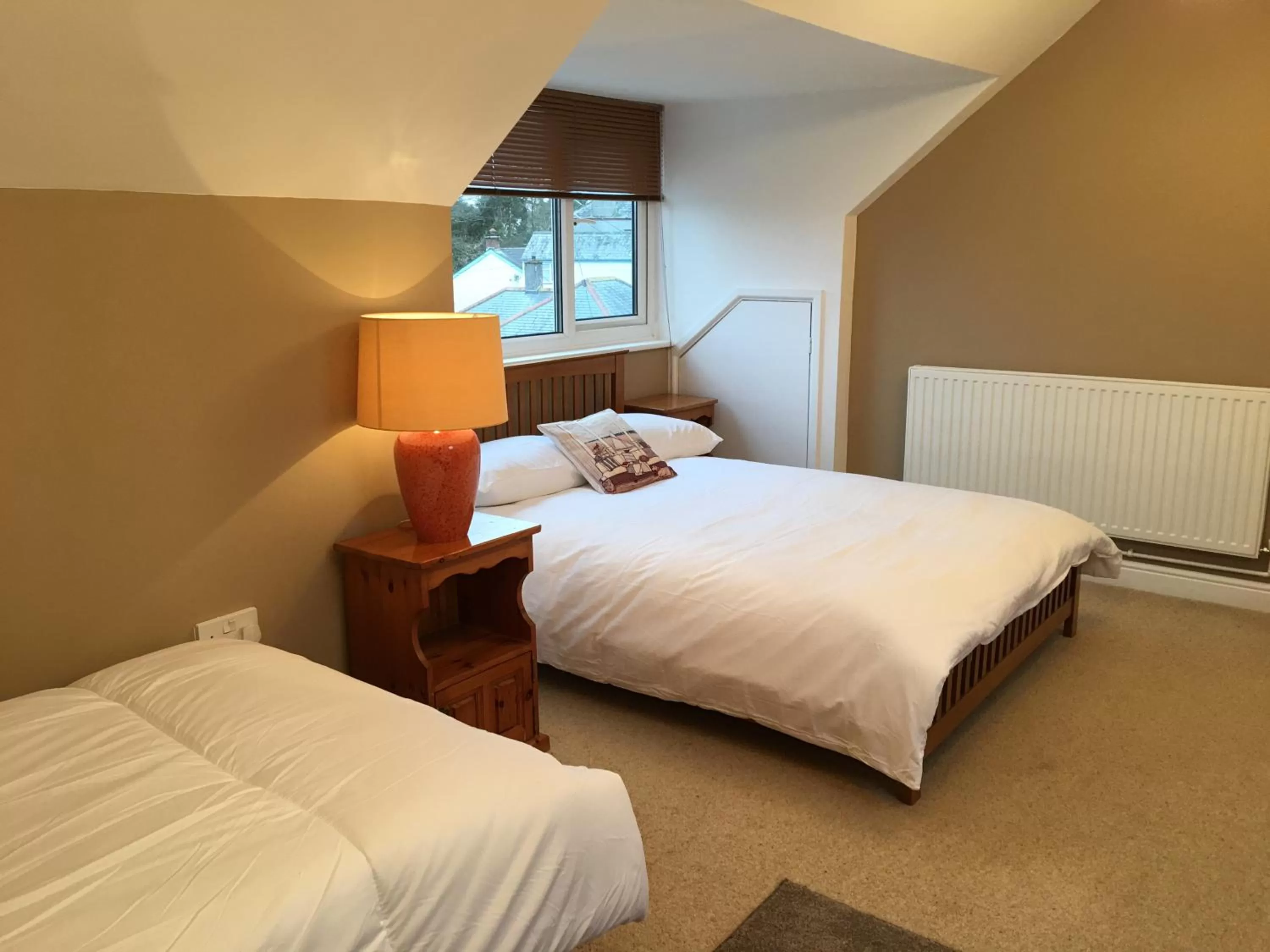 Bed in TRETHEWEY GUEST HOUSE