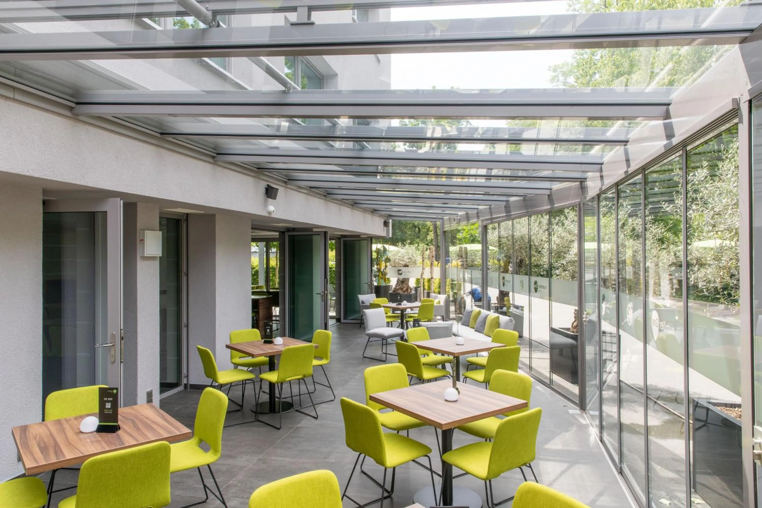 Communal lounge/ TV room in numberOne Hotel