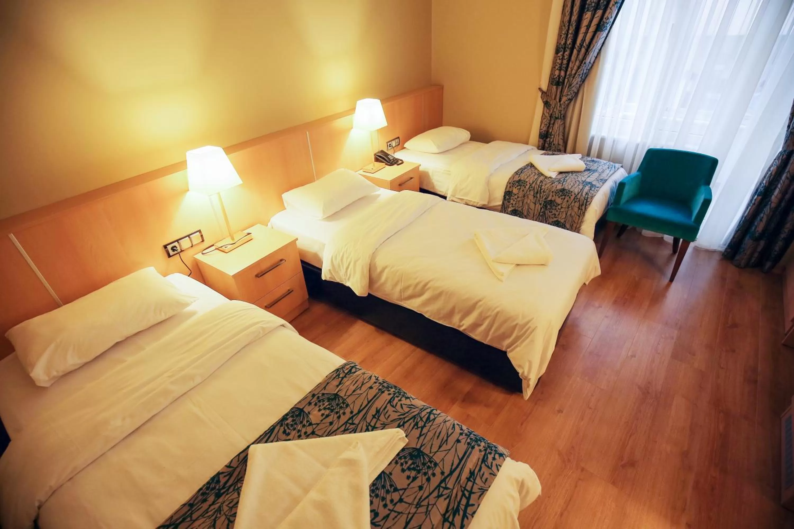 Bed in Artika Hotel