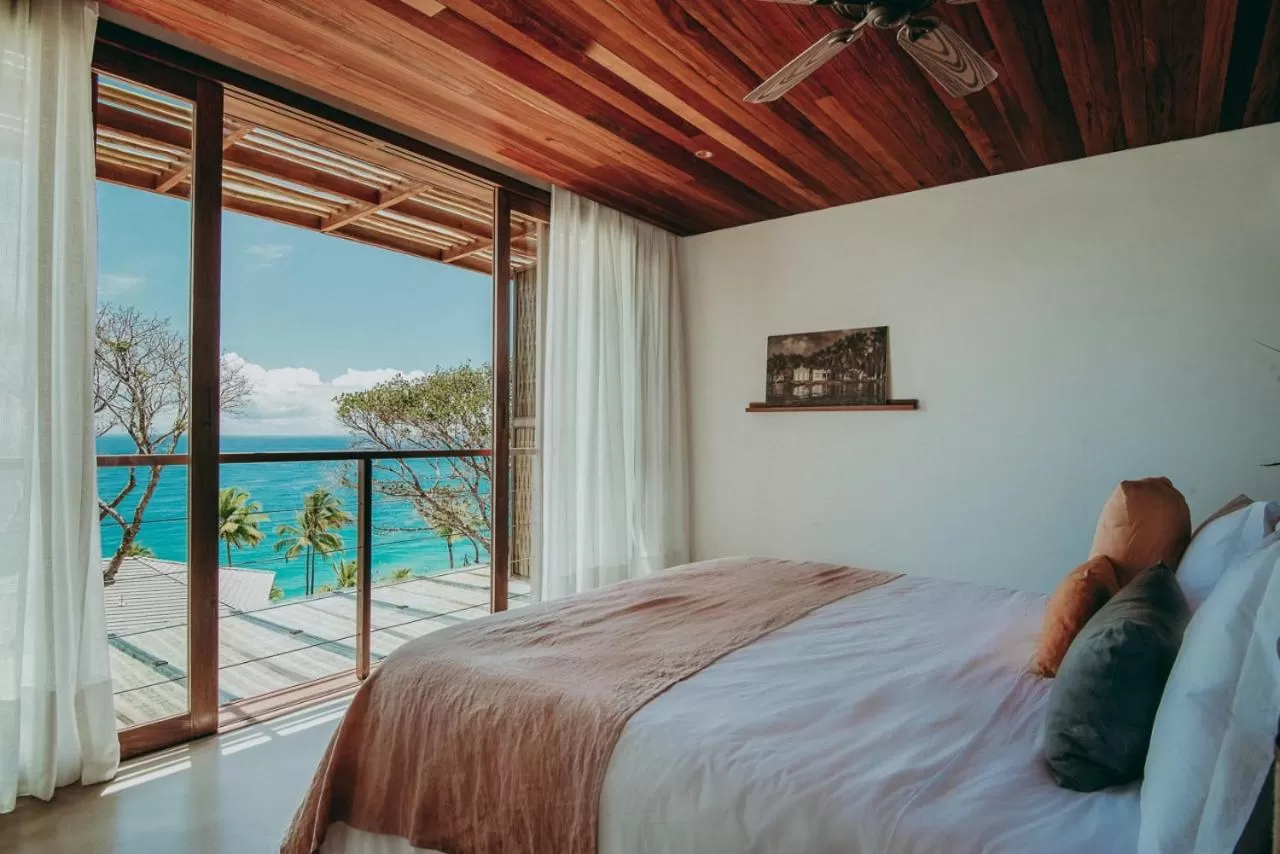 Bed in Barracuda Hotel & Villas