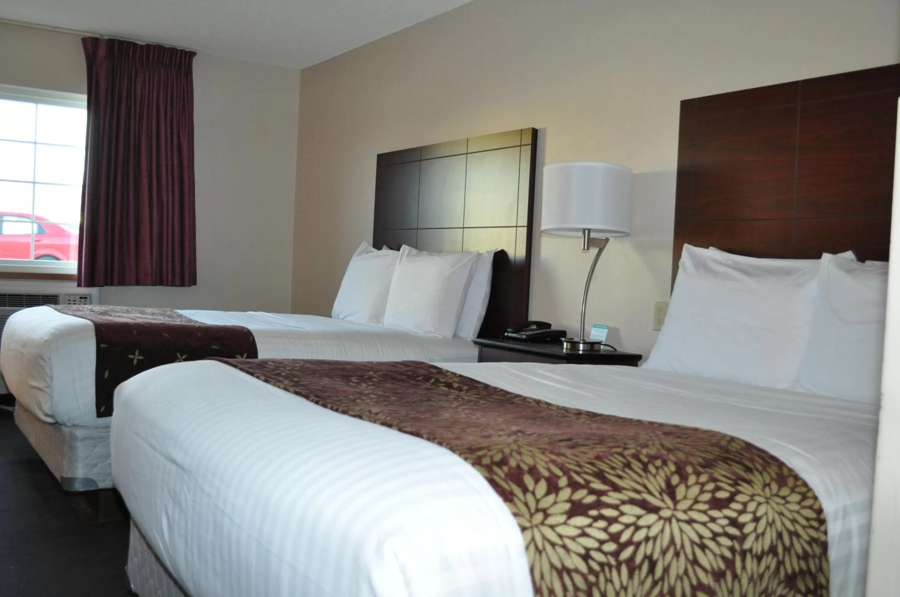 Bed in Boarders Inn & Suites by Cobblestone Hotels - Broken Bow