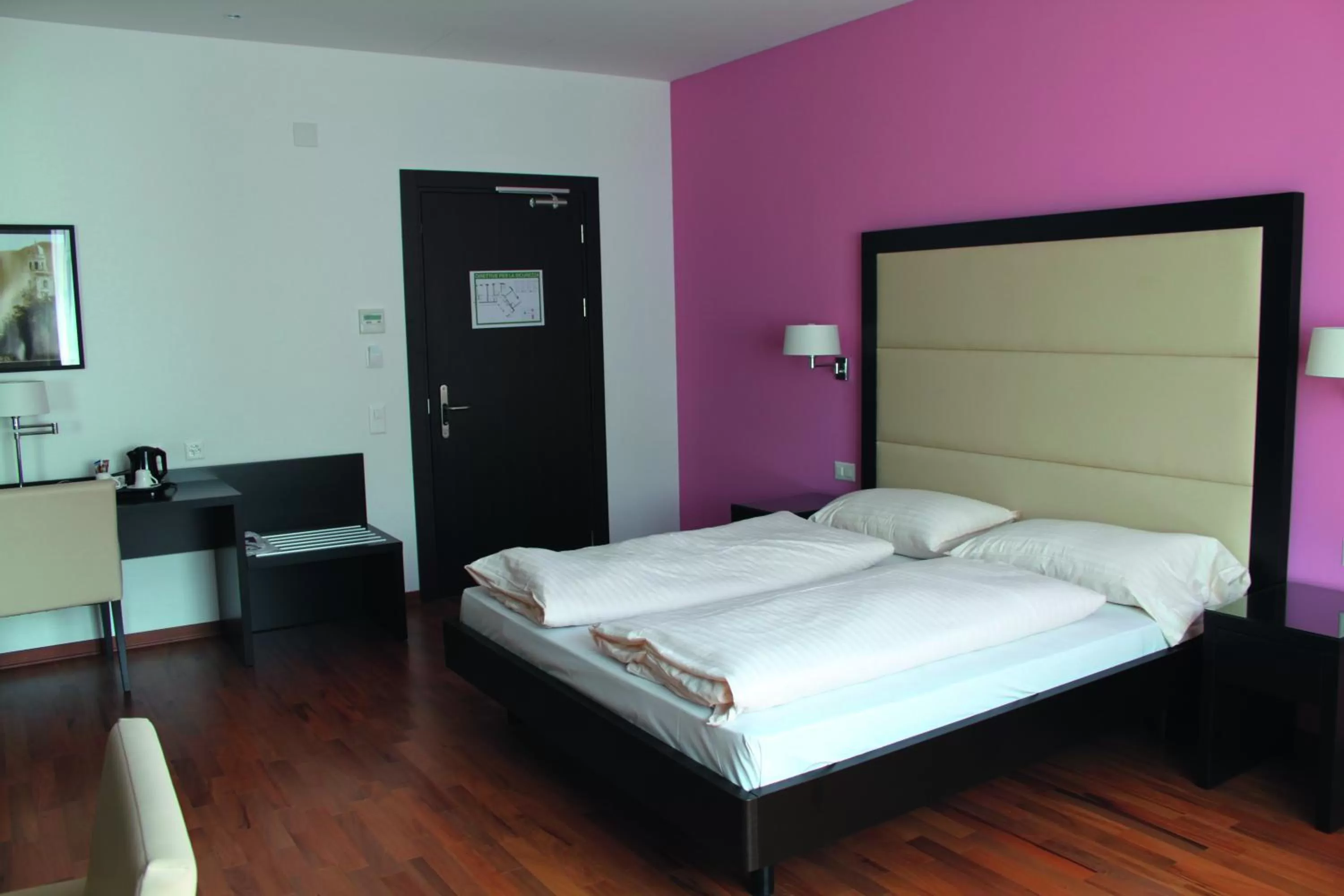 Bed in Enjoy 1313AG Hotel Touring
