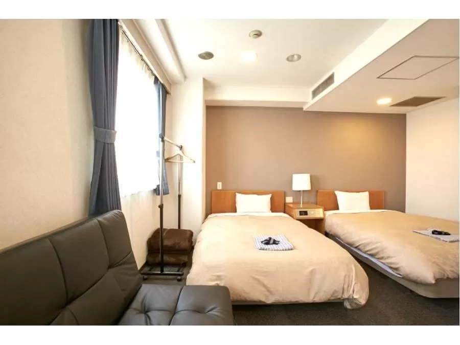 Bed in Hotel New Yutaka