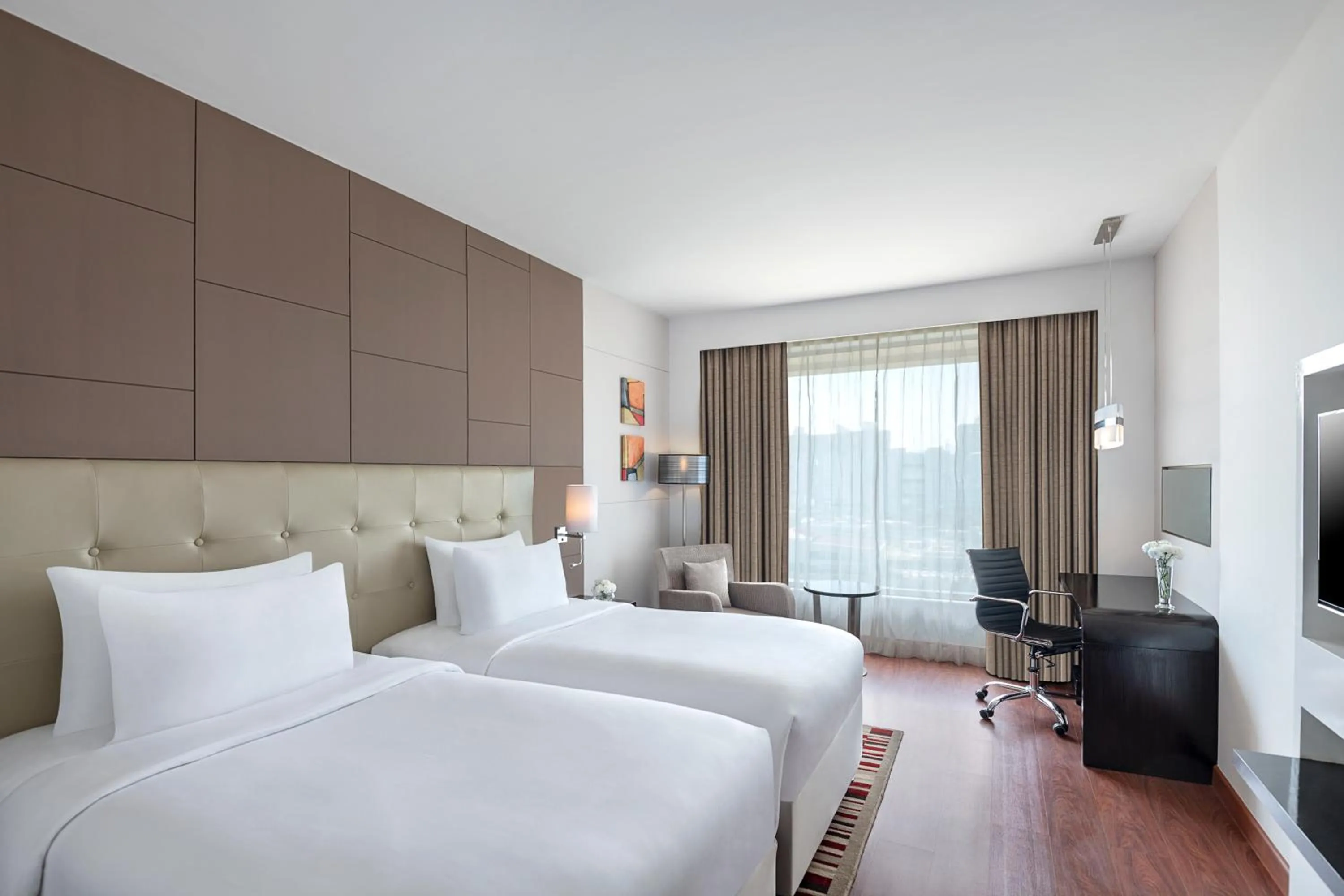 Photo of the whole room, Bed in Radisson Blu Pune Hinjawadi
