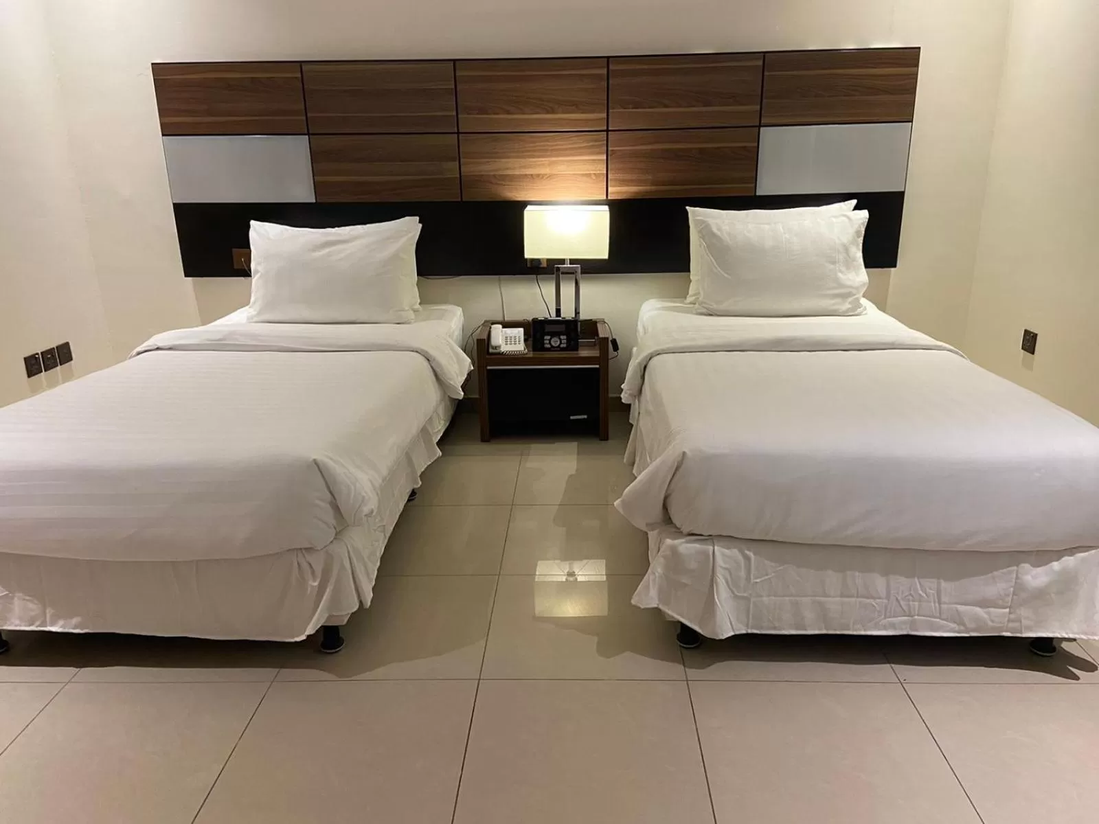 Bed in Friesian Hotel Suites