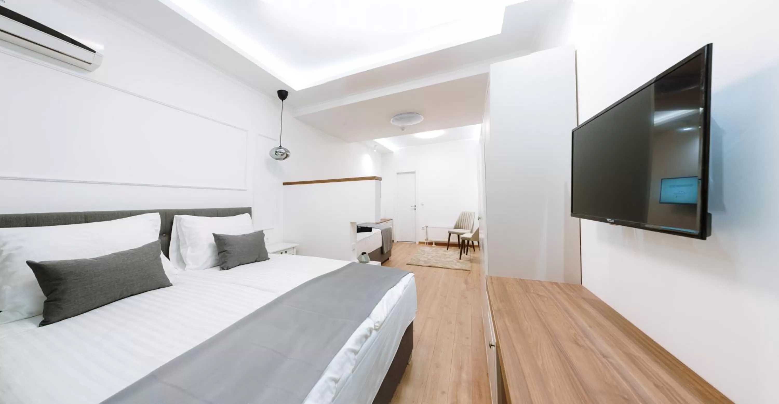 Bed in Boutique Hotel Nea