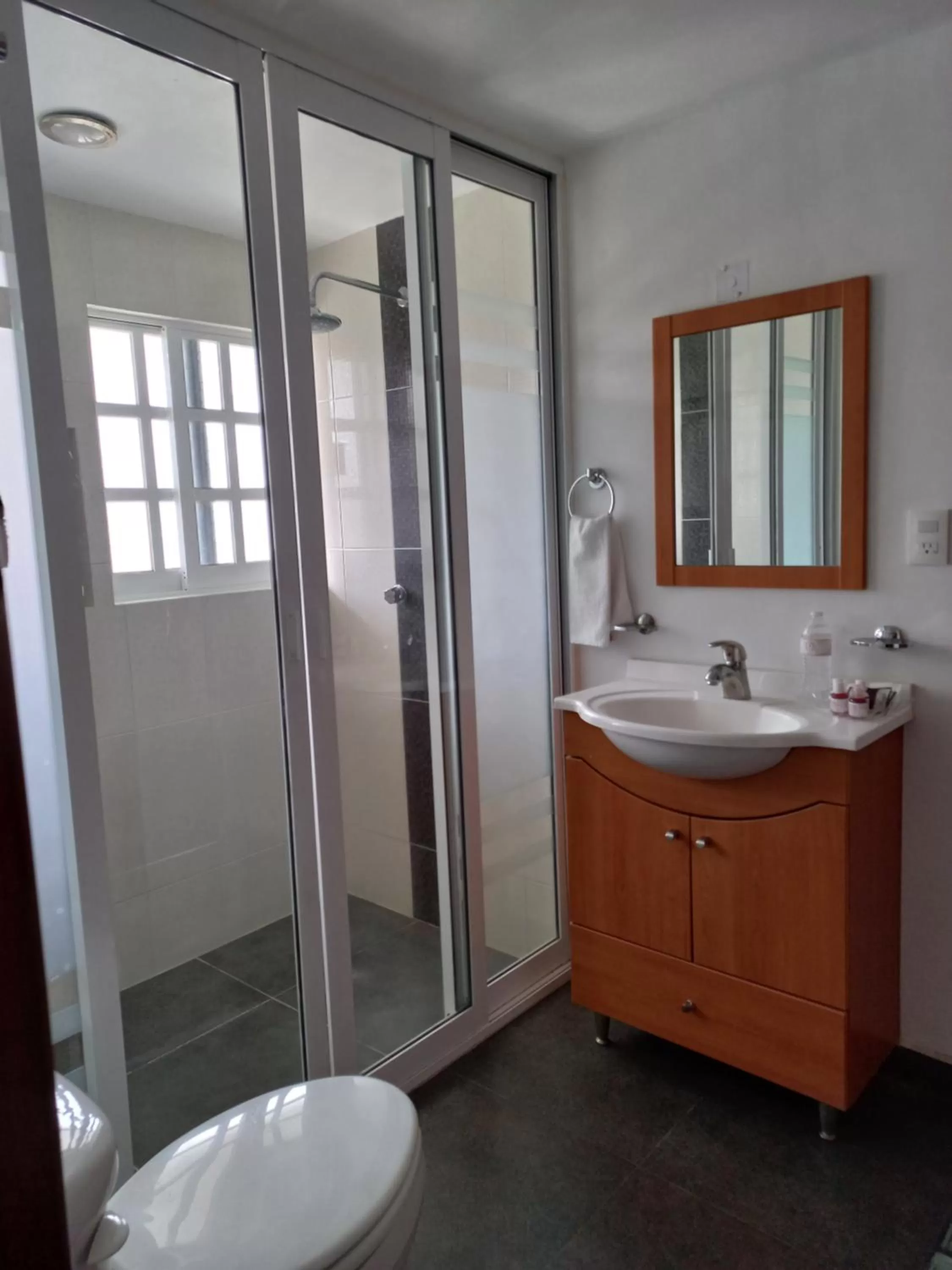 Shower in La Aurora Hotel Like Home