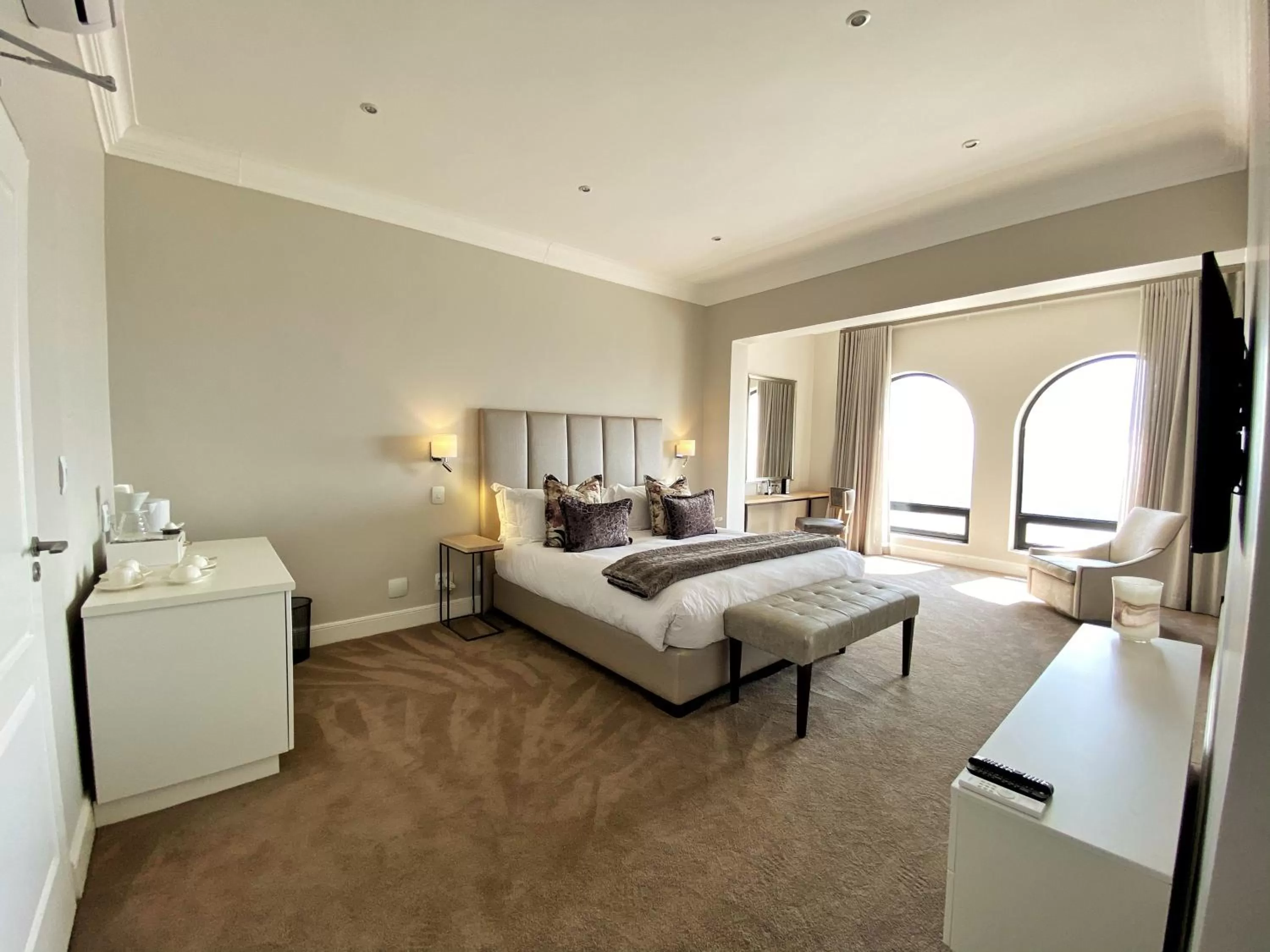 Bed in The Northcliff Boutique Hotel