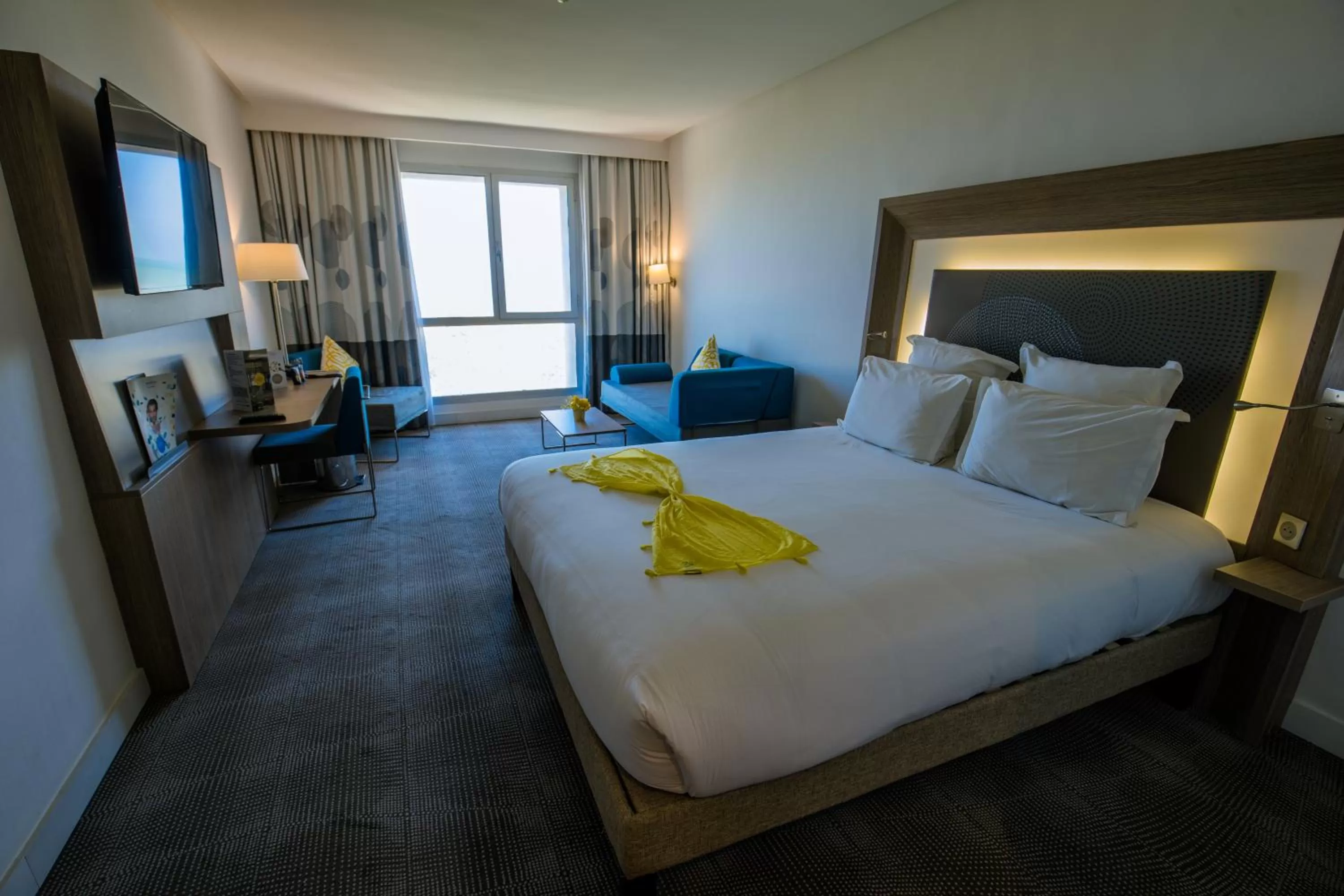 Living room, Bed in Novotel Mohammedia