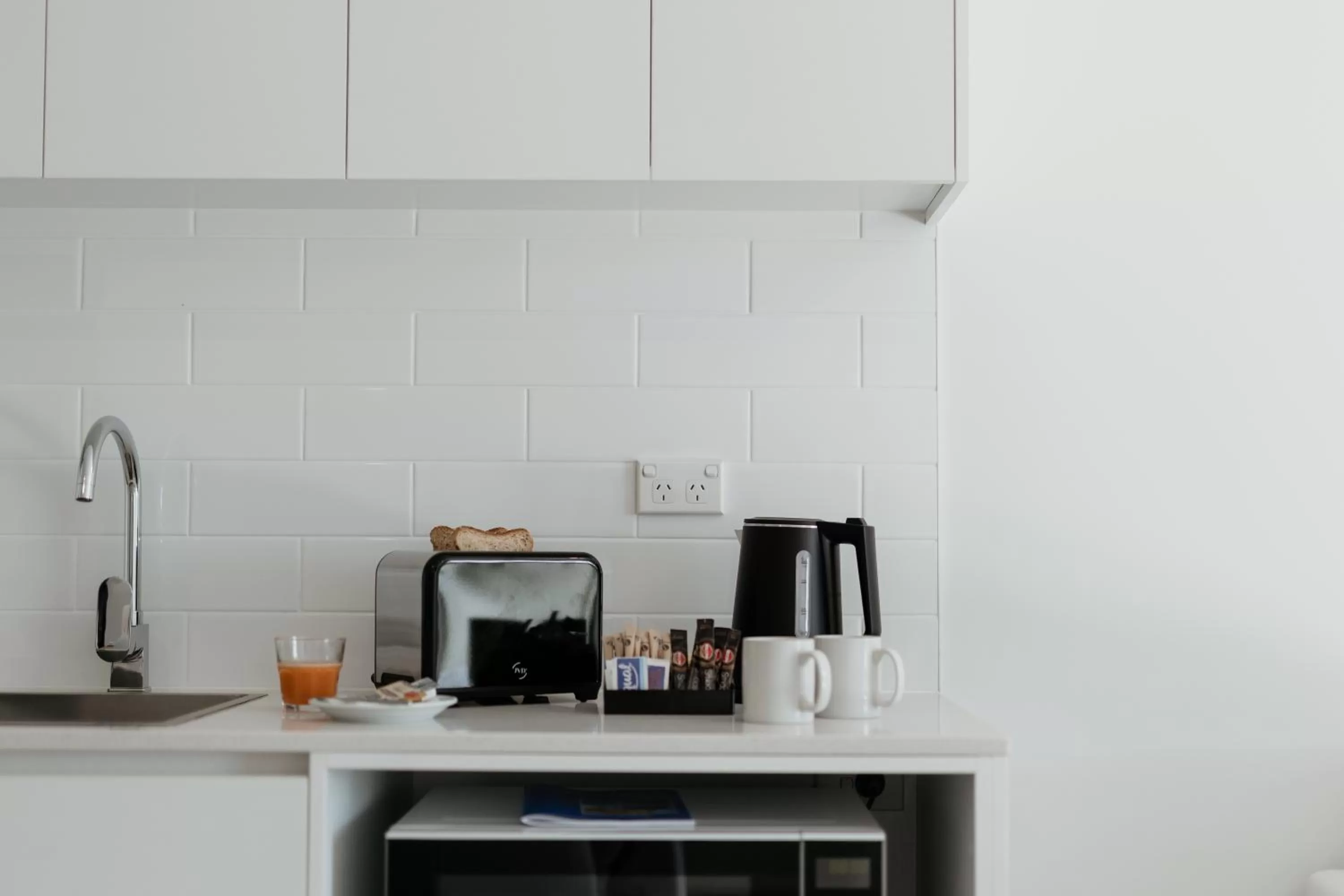 kitchen in Beach & Bay Stay Motel