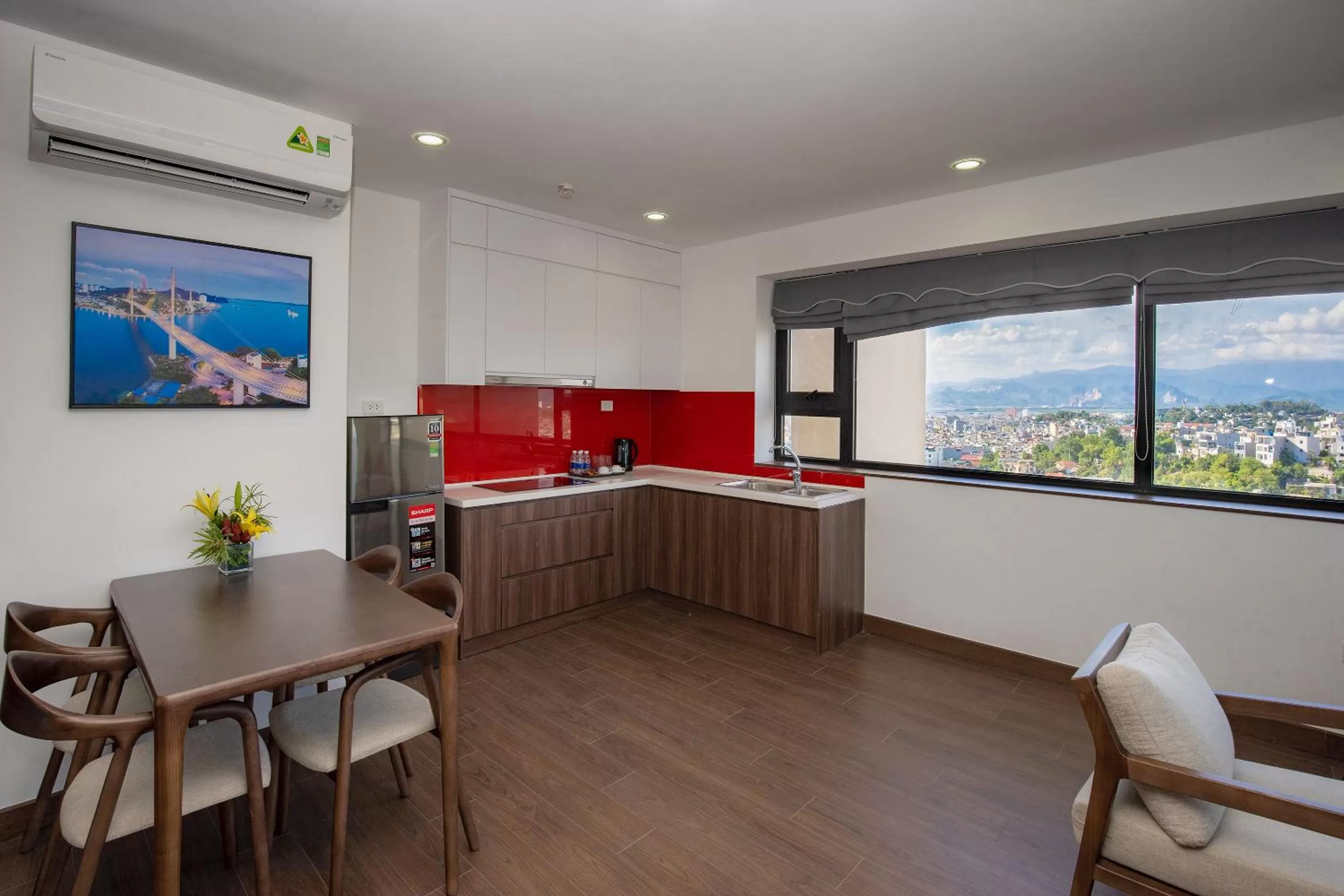 Kitchen or kitchenette in Ramada Hotel & Suites by Wyndham Halong Bay View