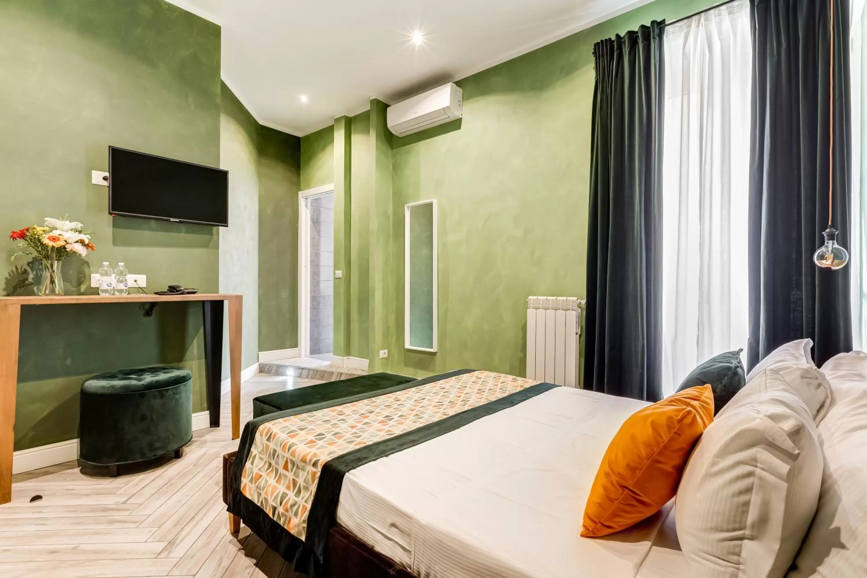 Bed in Ripetta Luxurious Suites