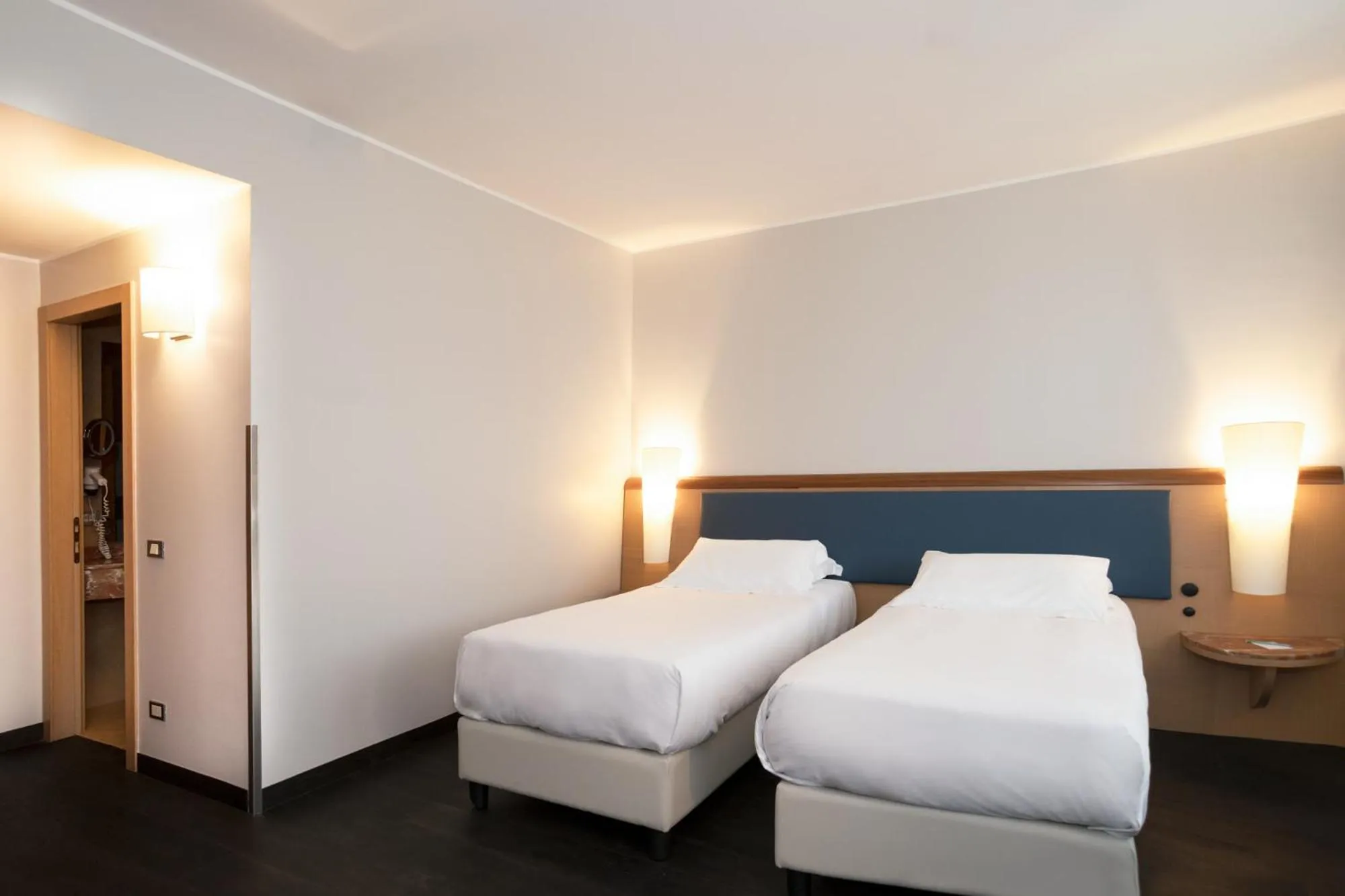 Bed in Mercure Roma West