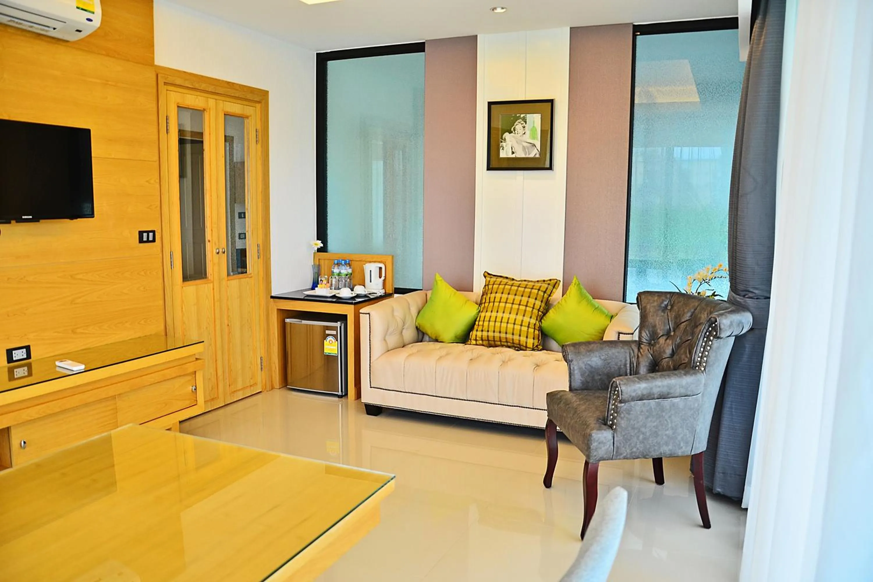 Living room in The Par Phuket SHA Plus