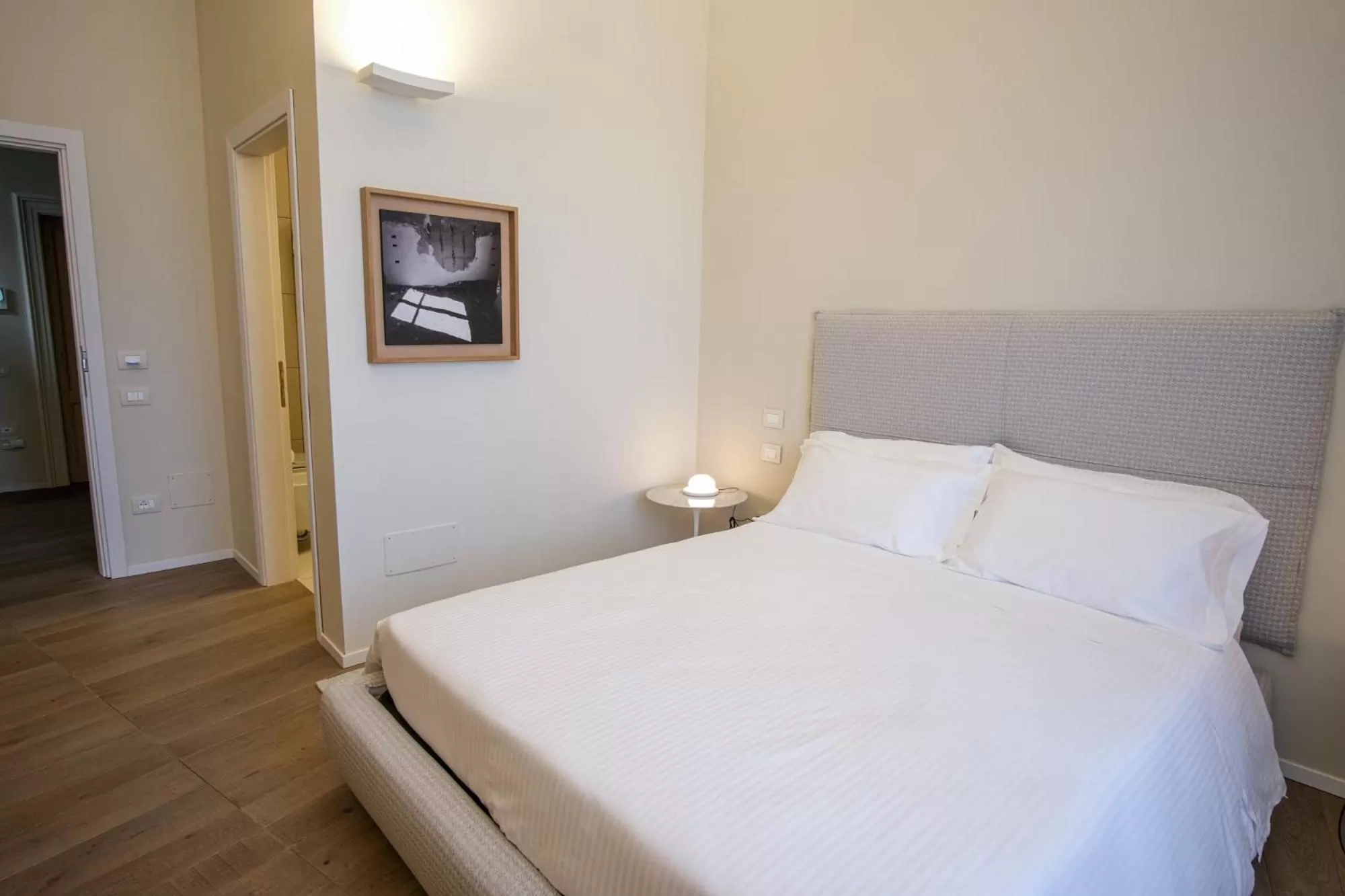 Bed in Dimora de Matera Luxury Suites