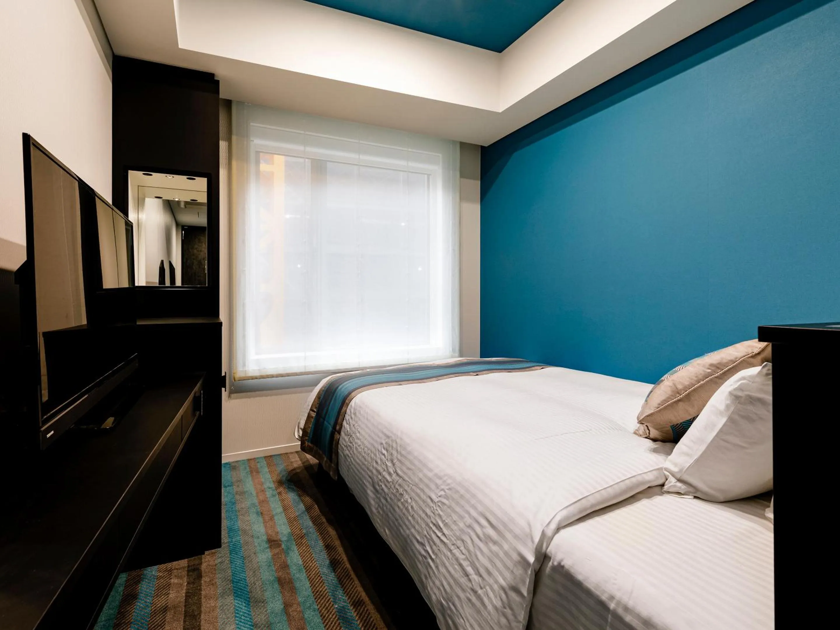 Bed in Hotel Dans Le Coeur Osaka Umeda