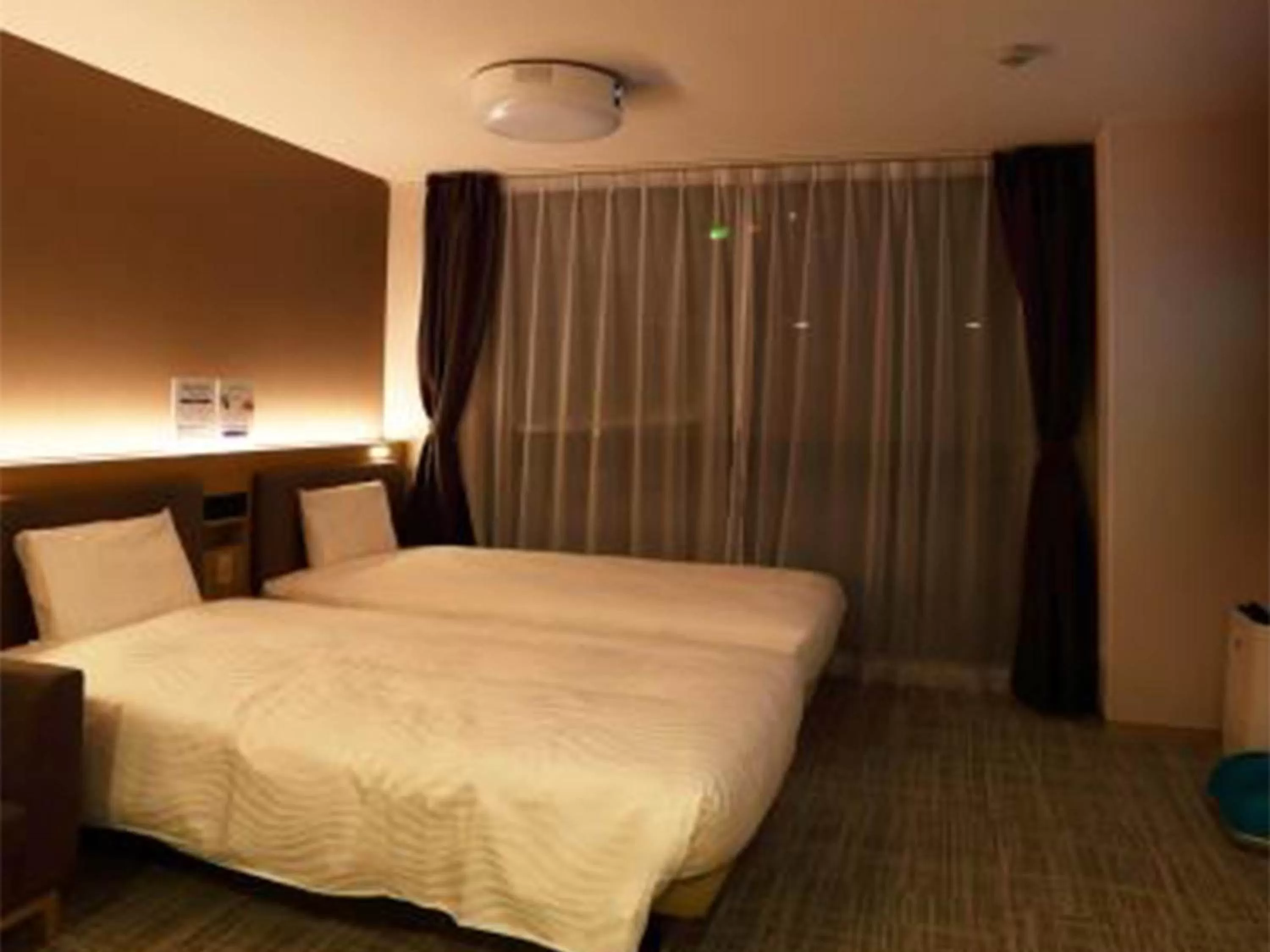 Bed in Henn na Hotel Kansai Airport