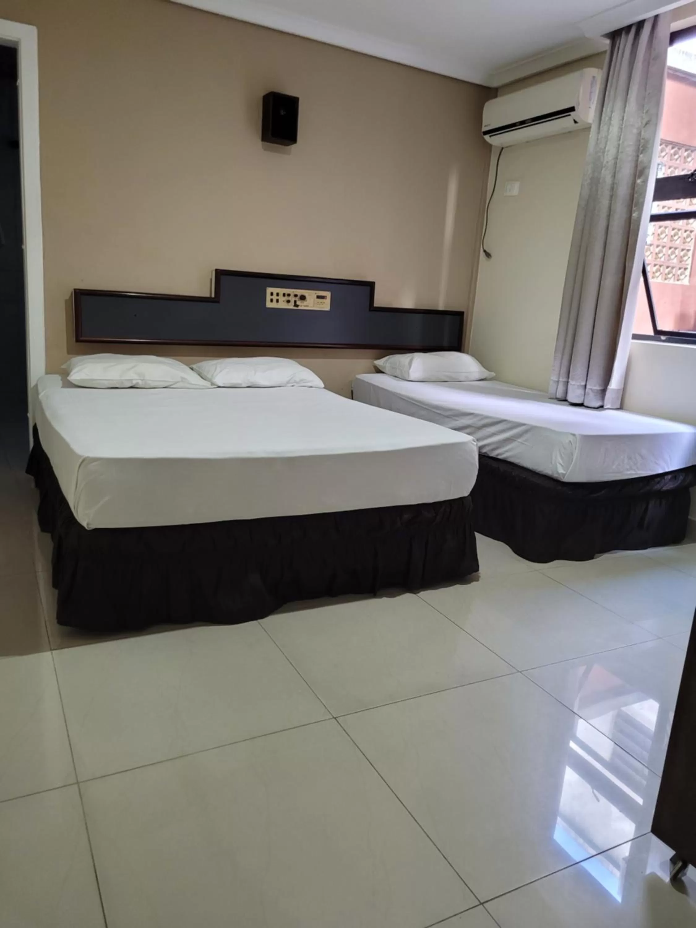 Bed in Hotel Estação Express