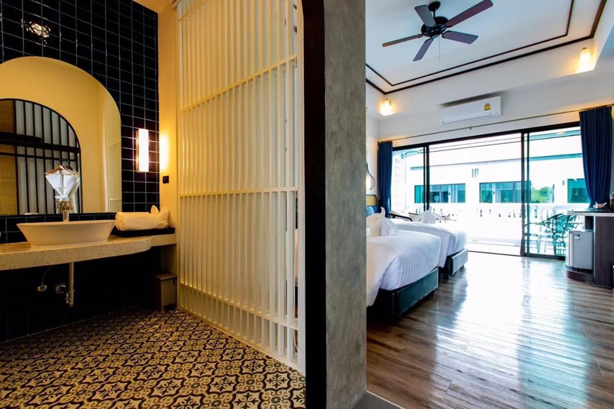 Bed in Chaanburi Boutique Resort