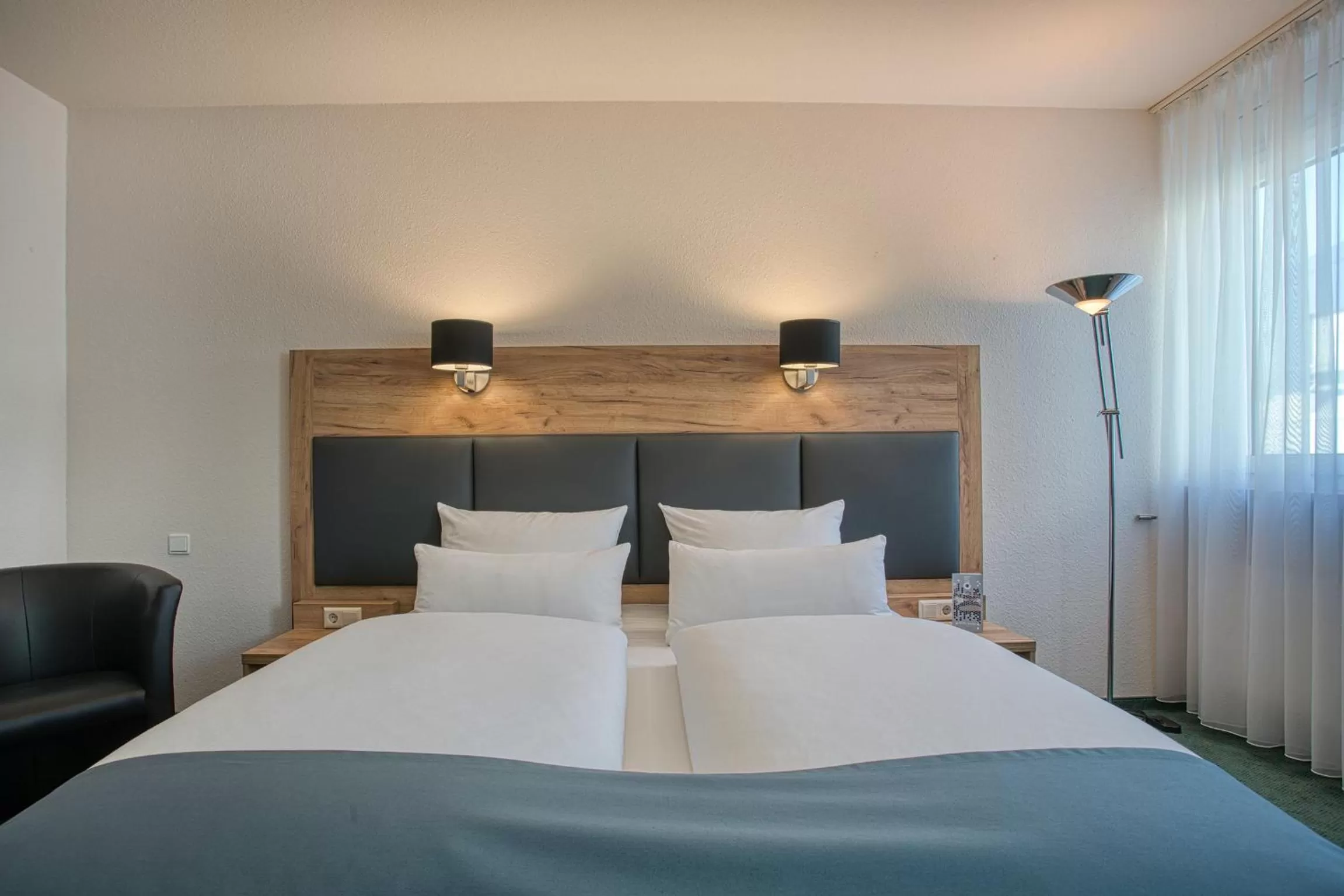 Photo of the whole room, Bed in Centro Hotel Böblingen, Trademark Collection by Wyndham