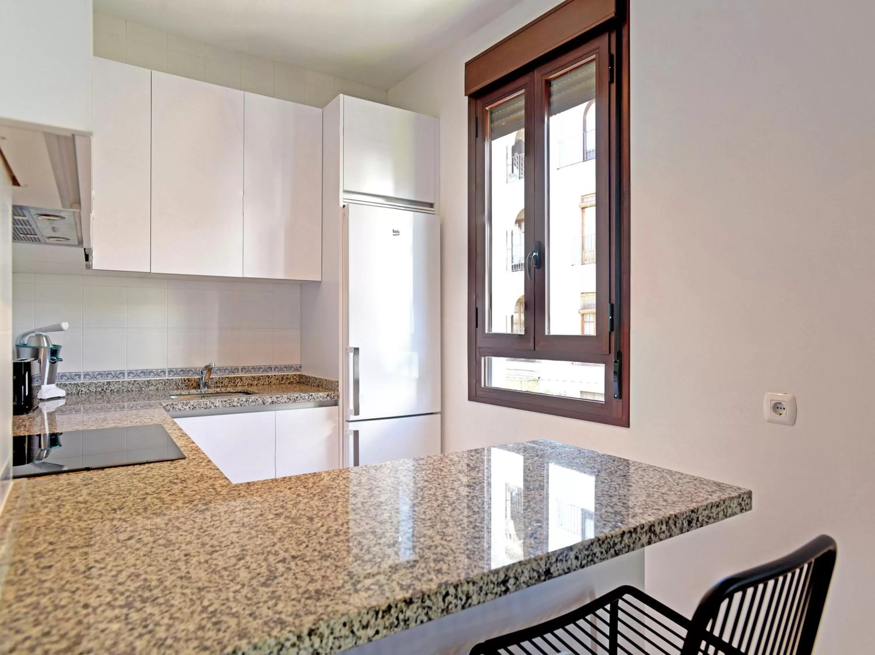 Kitchen or kitchenette in Apartamentos Santiago