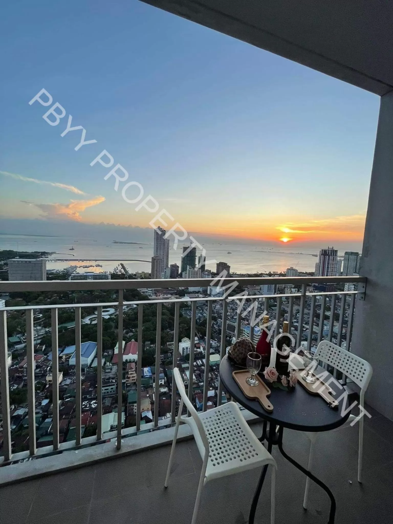 Sunset in Green Residences Staycation by PBYY