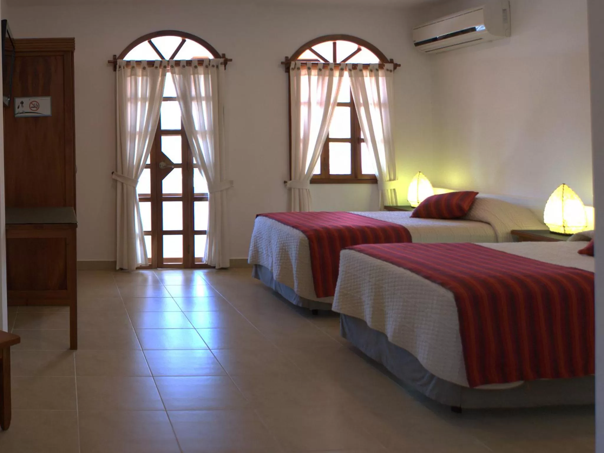 Bedroom, Bed in Hotel Galapagos Suites B&B