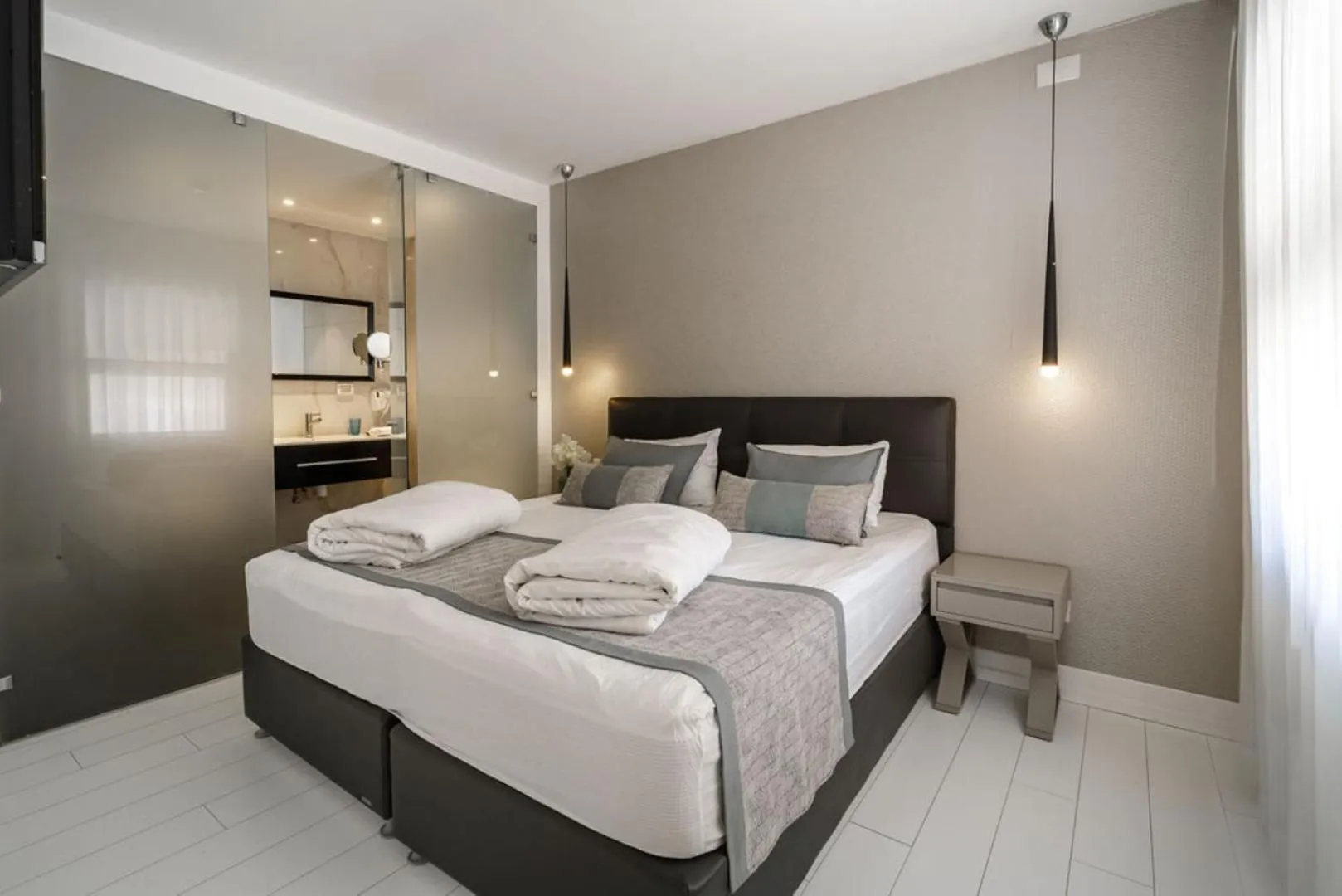 Bed in Kikar Boutique Hotel