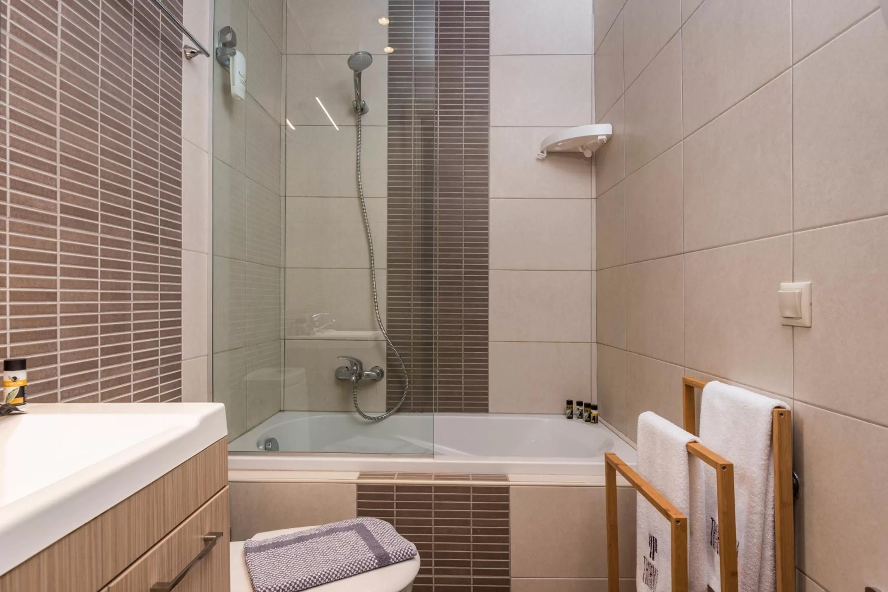 Bathroom in Trianon Luxury Apartments & Suites
