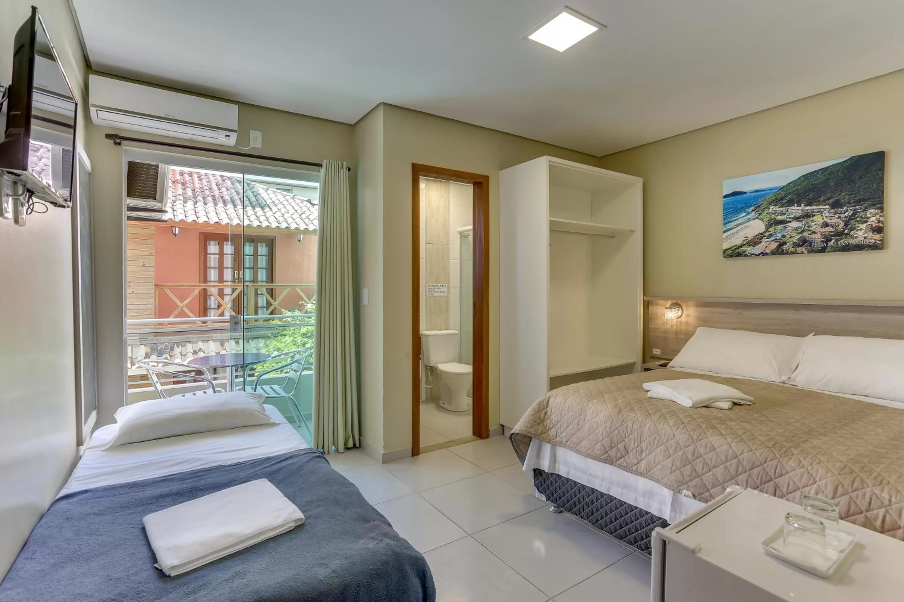 Bed in Pousada Tissiano