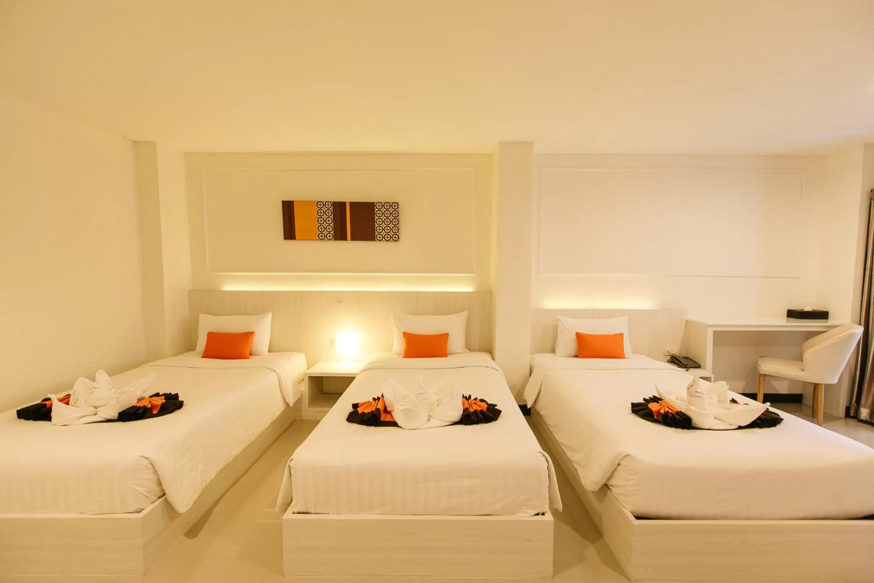 Bed in De Hug Hotel & Residence