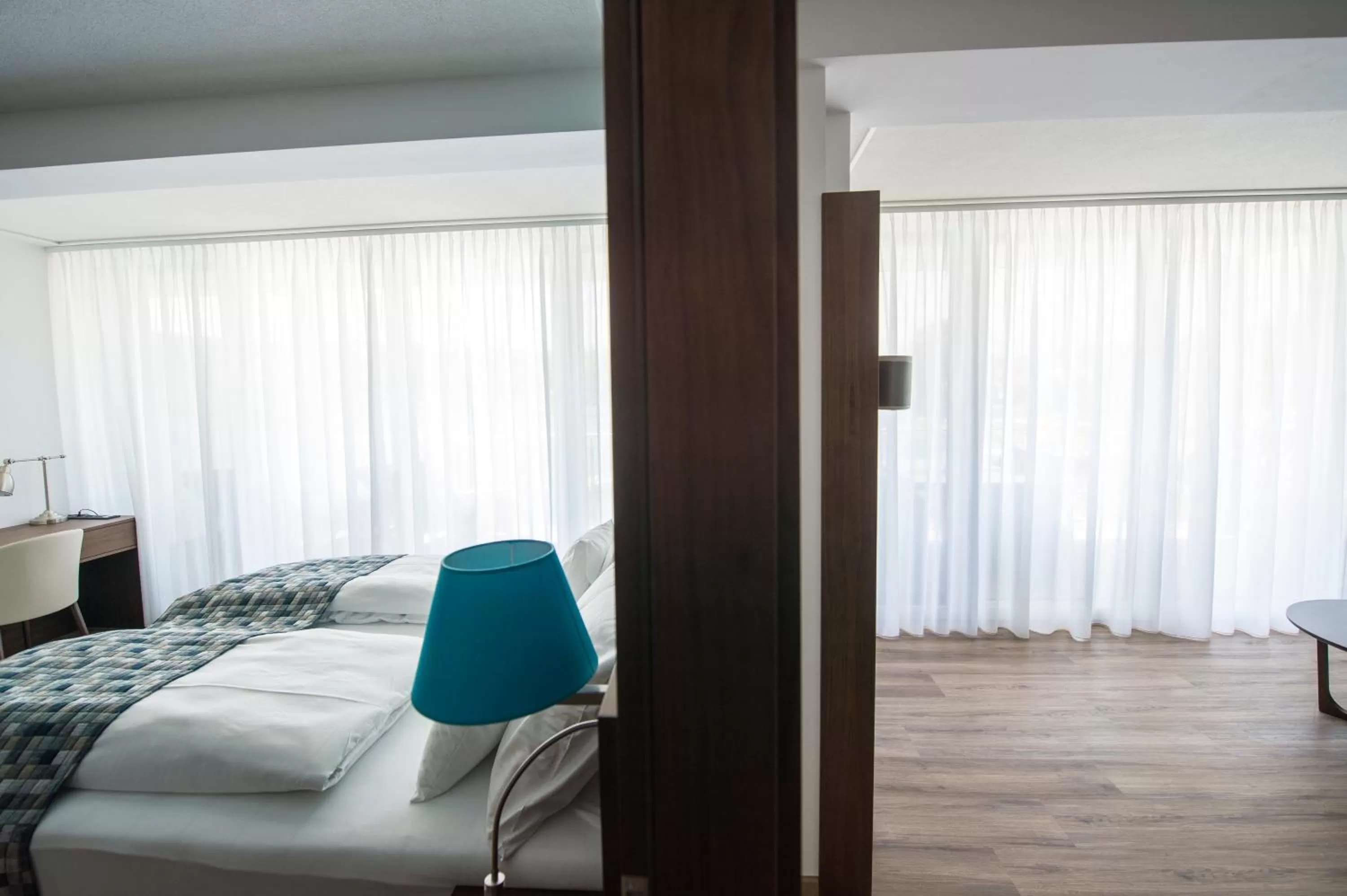 Photo of the whole room, Bed in Boutiquehotel Wörthersee - Serviced Apartments