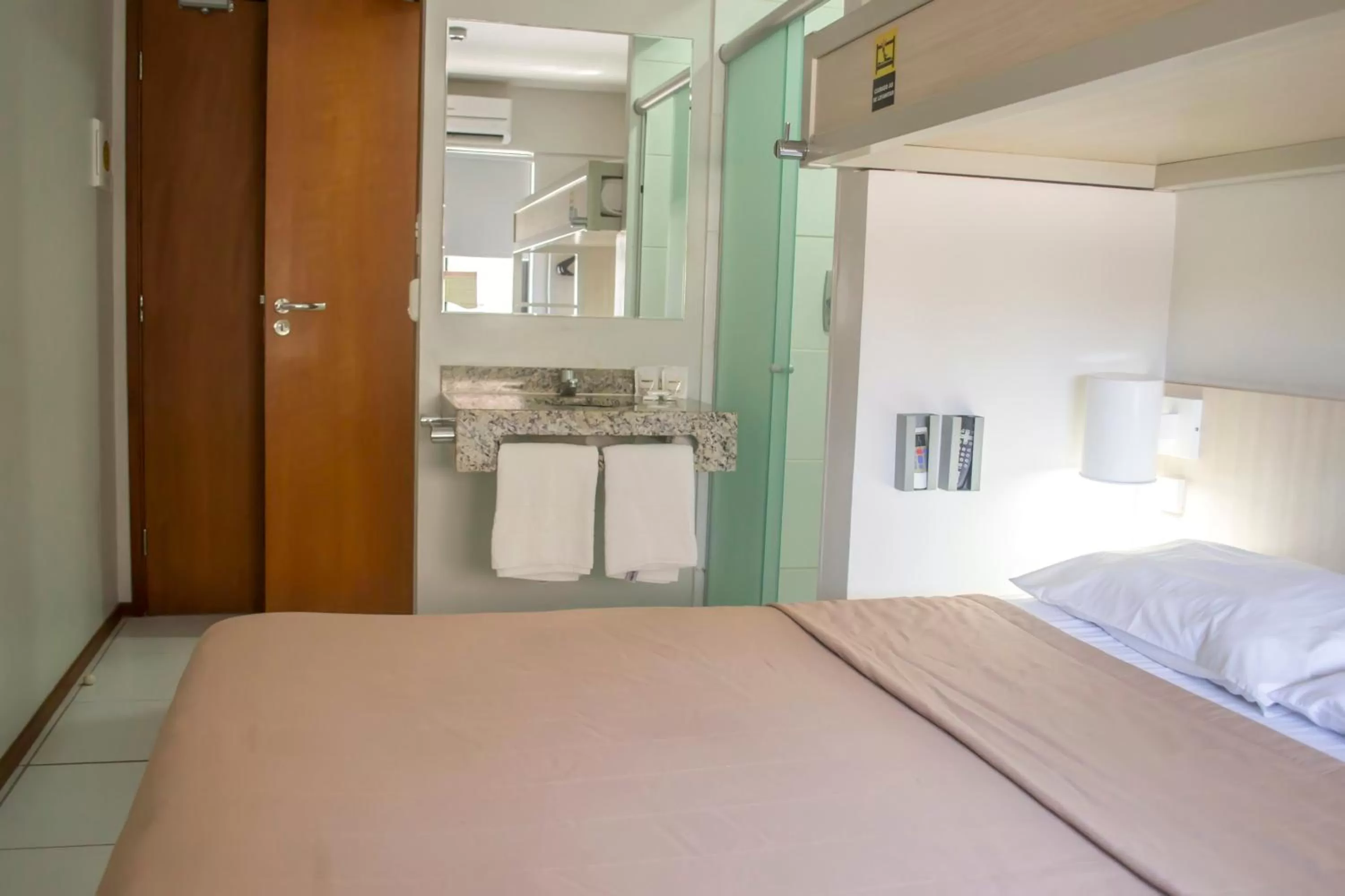 Bed in EXPRESSO R1 HOTEL