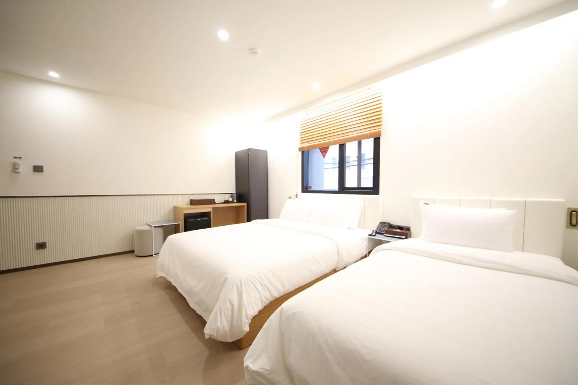 Bed in Jjak Boutique Hotel